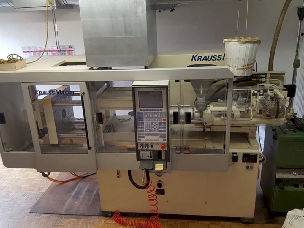 Vista Frontal da Krauss Maffei 40-125 C Winner máquina