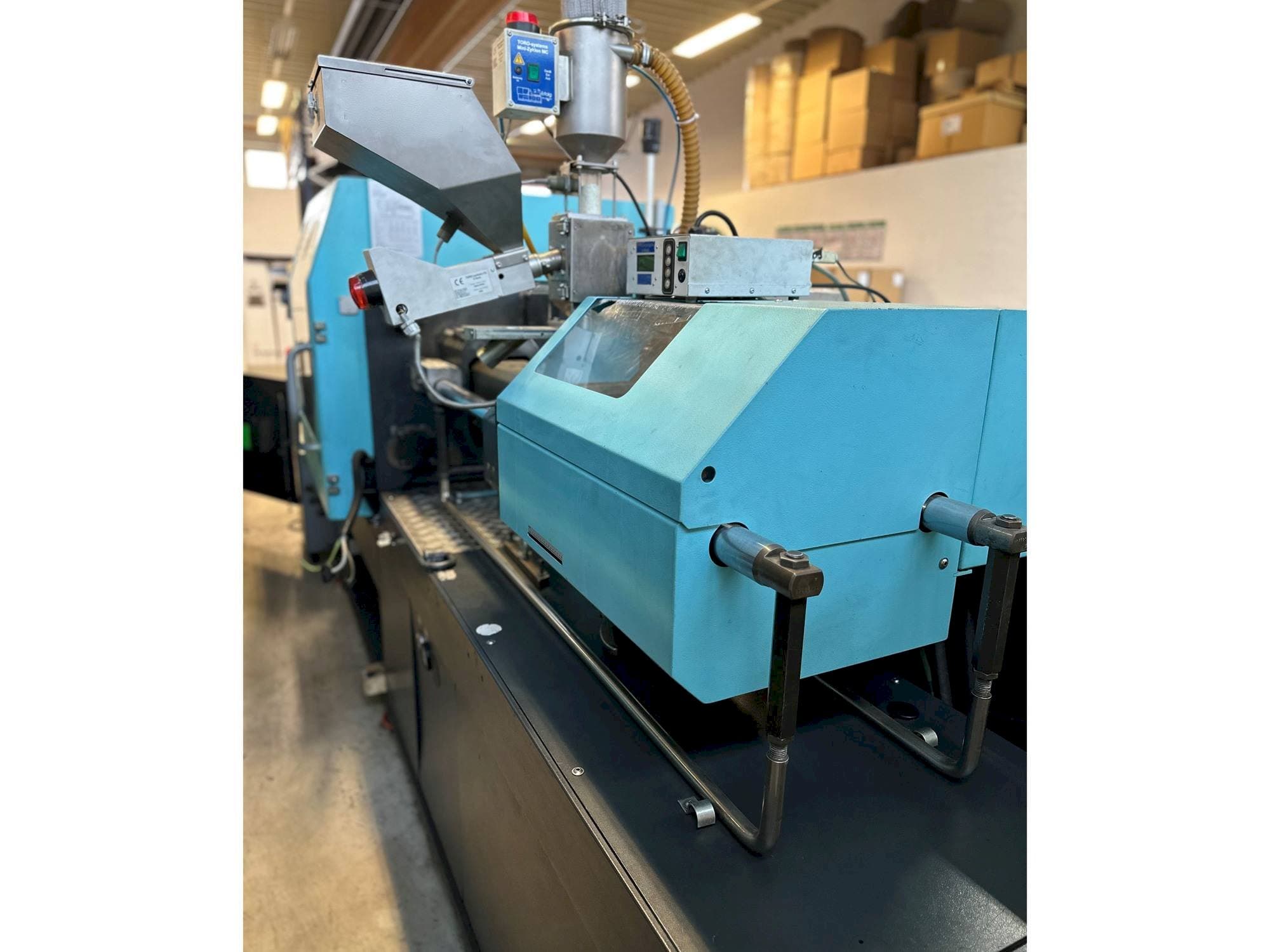 Vista Frontal  da DEMAG Concept 80/370-120  máquina