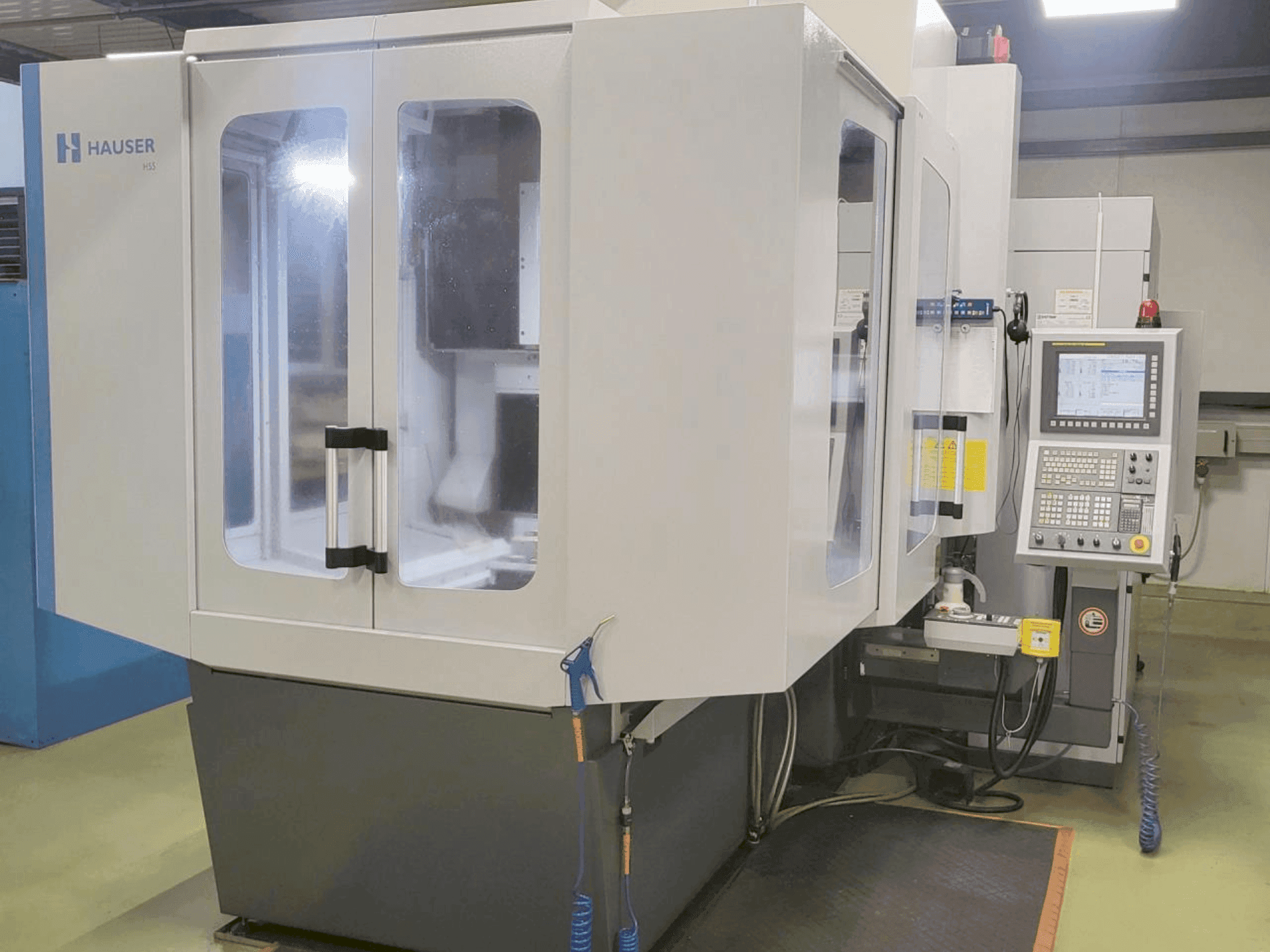 Vista Frontal  da HAUSER KELLENBERGER H55-400  máquina