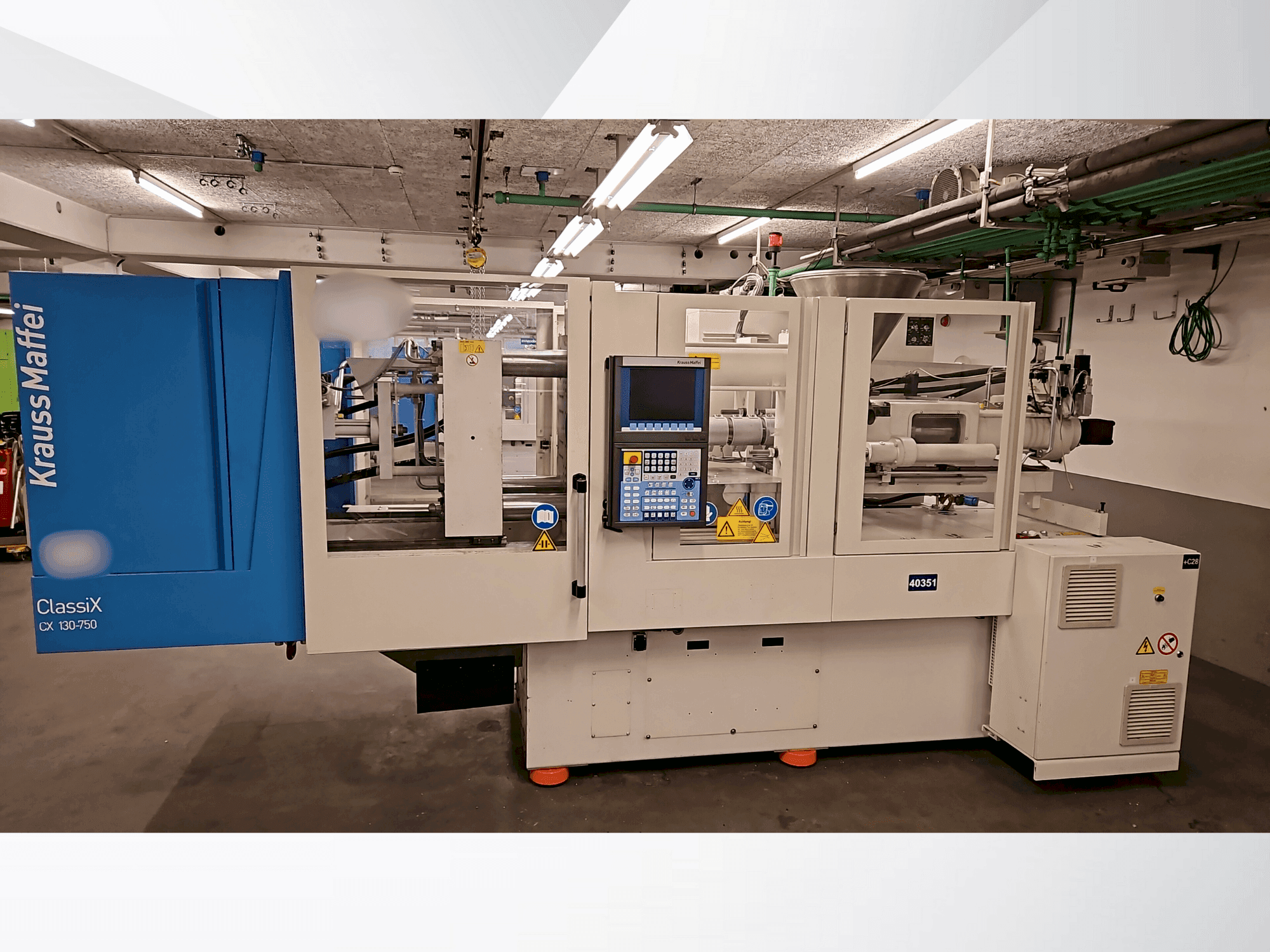 Vista Frontal  da Krauss Maffei 130-750 CX  máquina