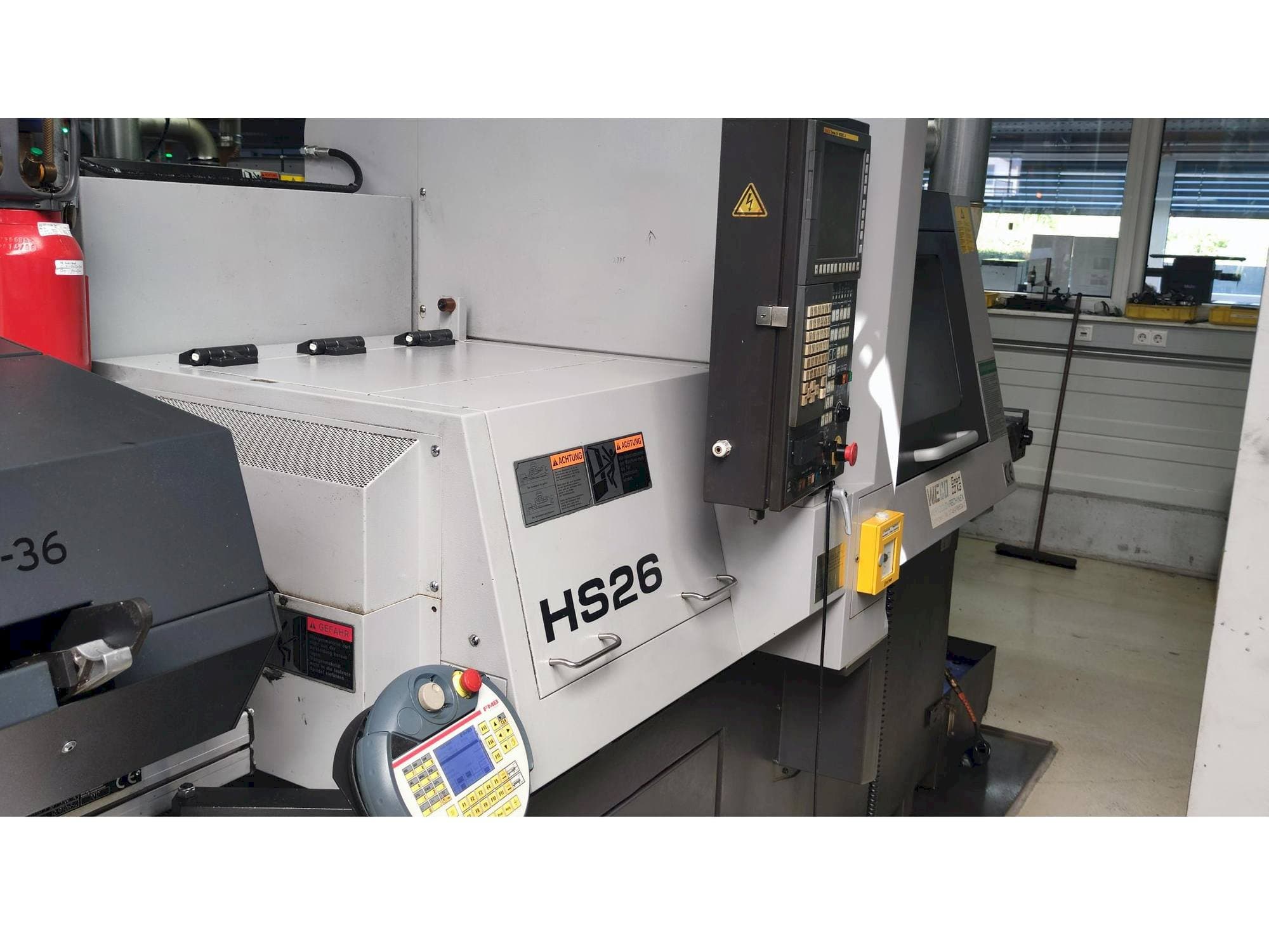 Vista Lateral Esquerda da TSUGAMI HS26 máquina