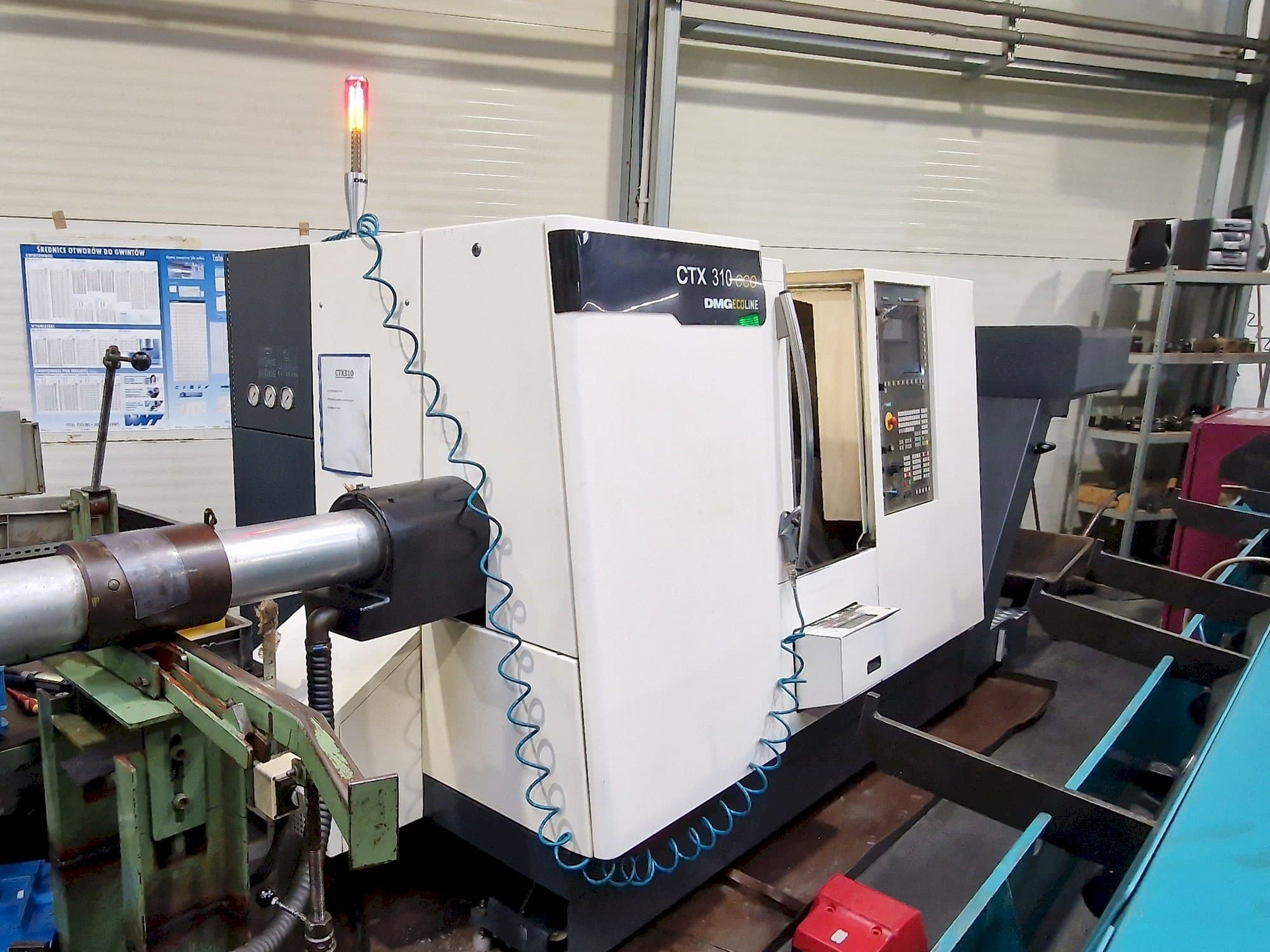 Vista Lateral Esquerda da DMG CTX 310 ecoline máquina