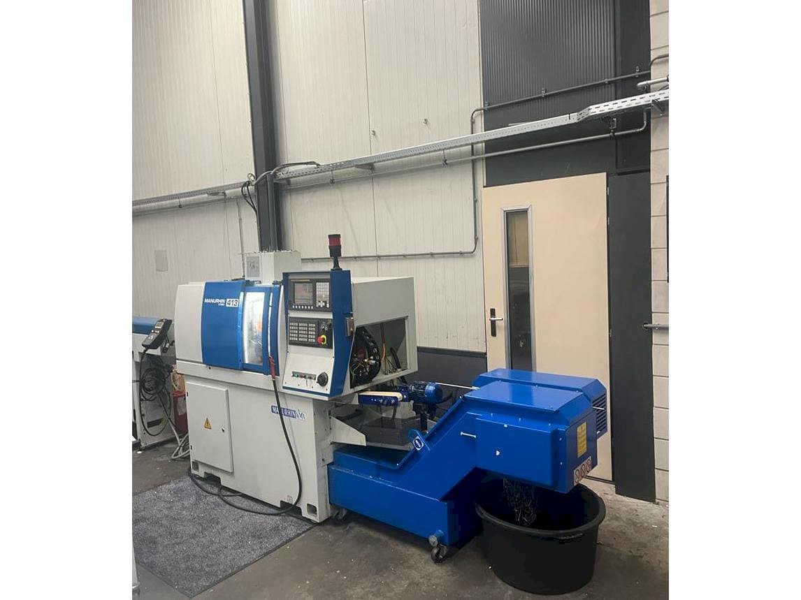 Vista Frontal  da Manurhin K'MX 413  máquina