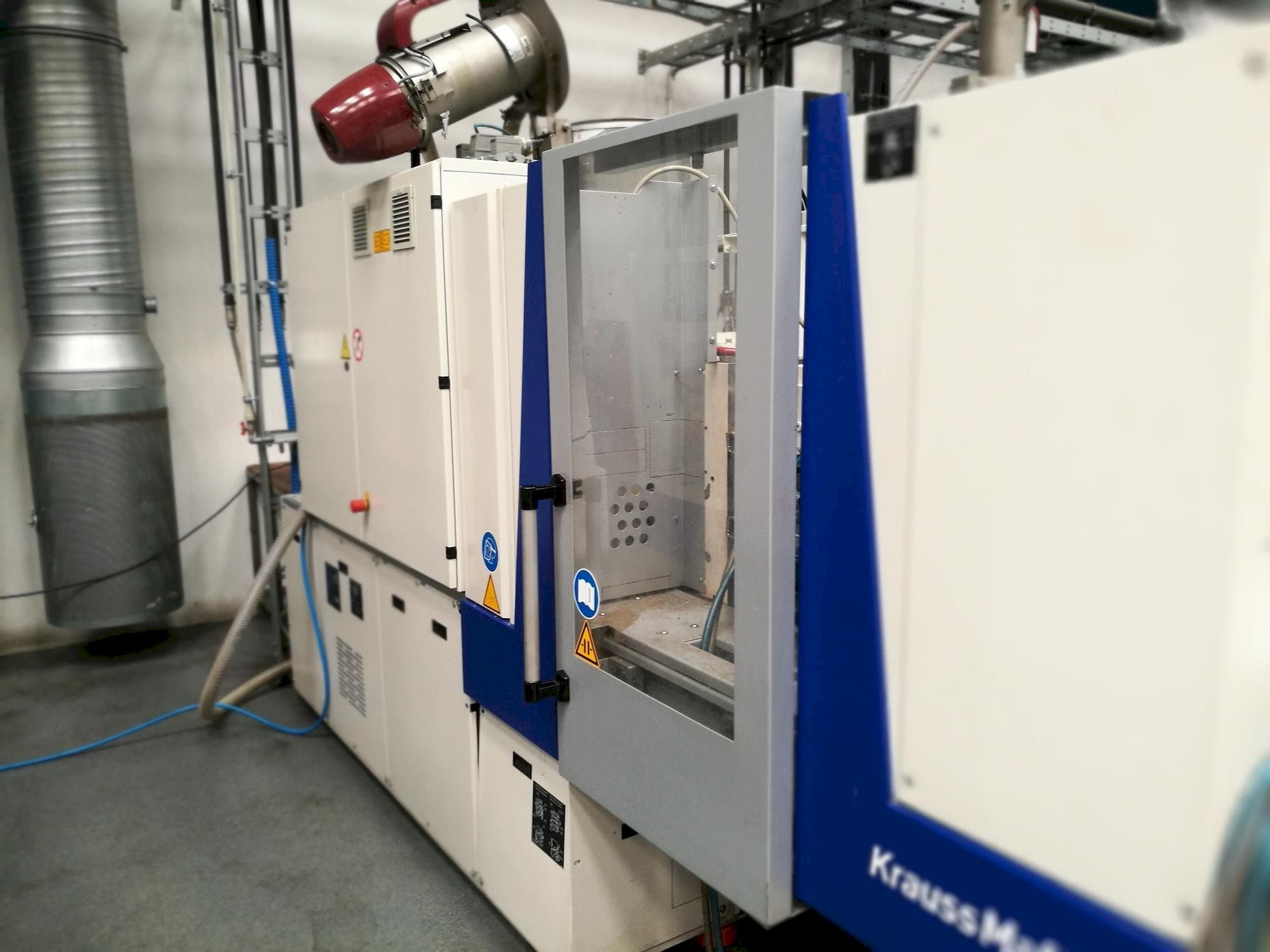 Vista Frontal  da Krauss Maffei KM 35-55 CX  máquina