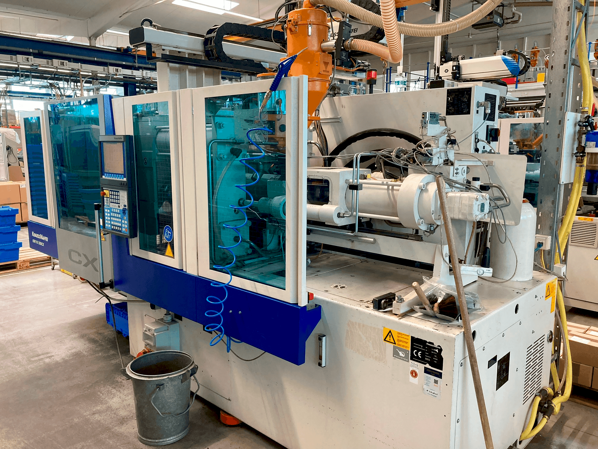 Vista Frontal da Krauss Maffei 110–380 CX máquina