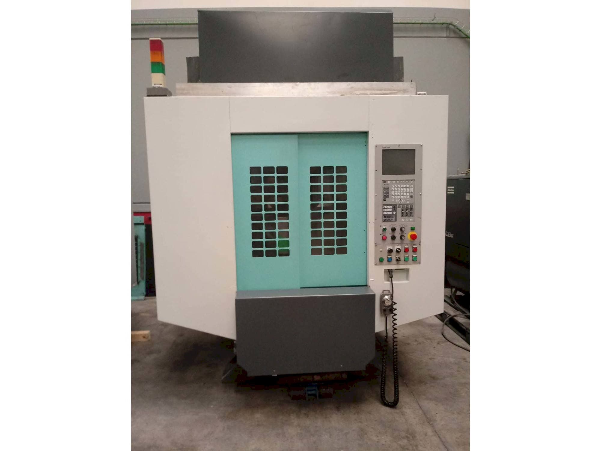 Vista Frontal da Brother TC-S2DN-O máquina