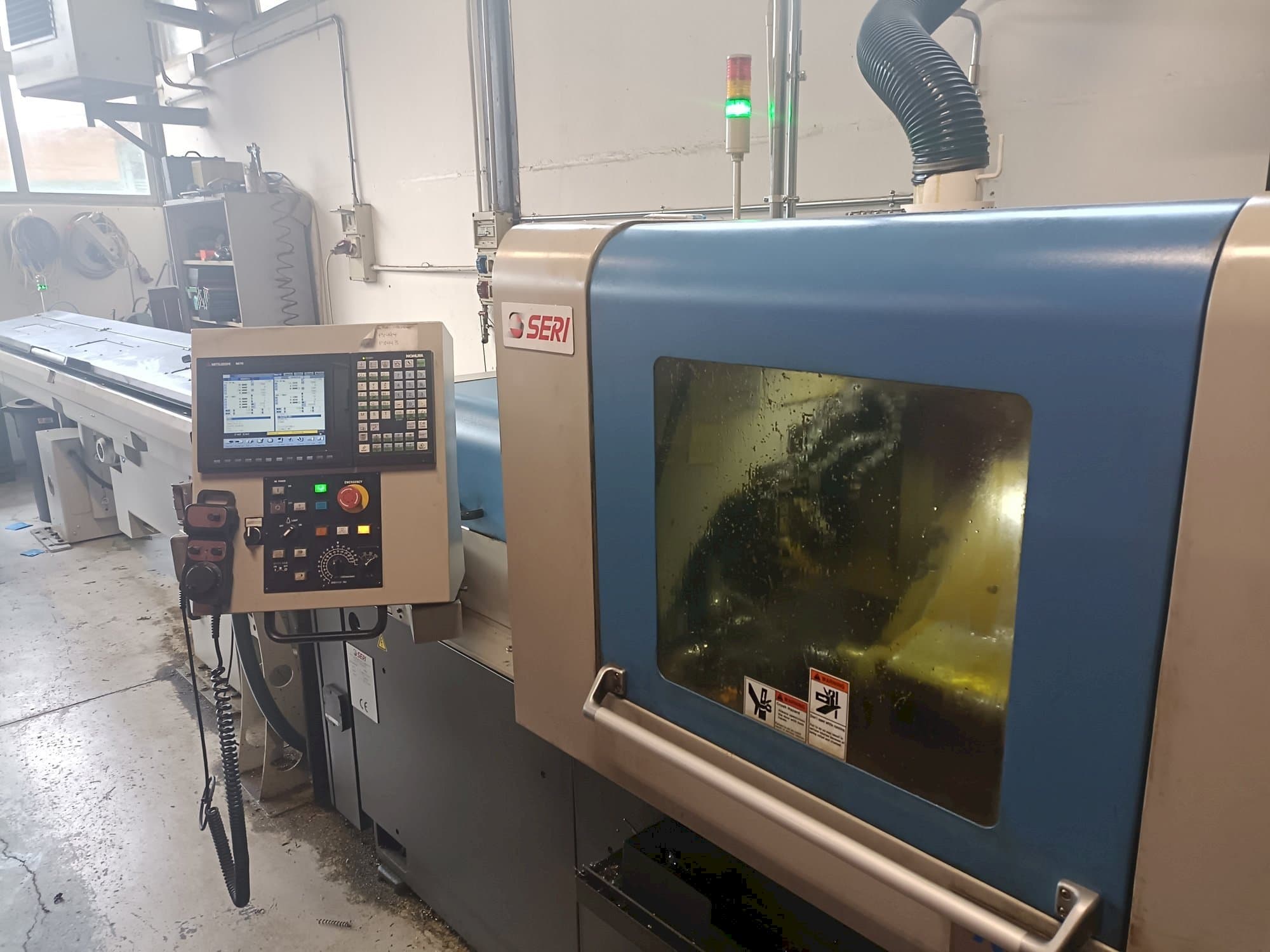 Vista Frontal da NOMURA máquina