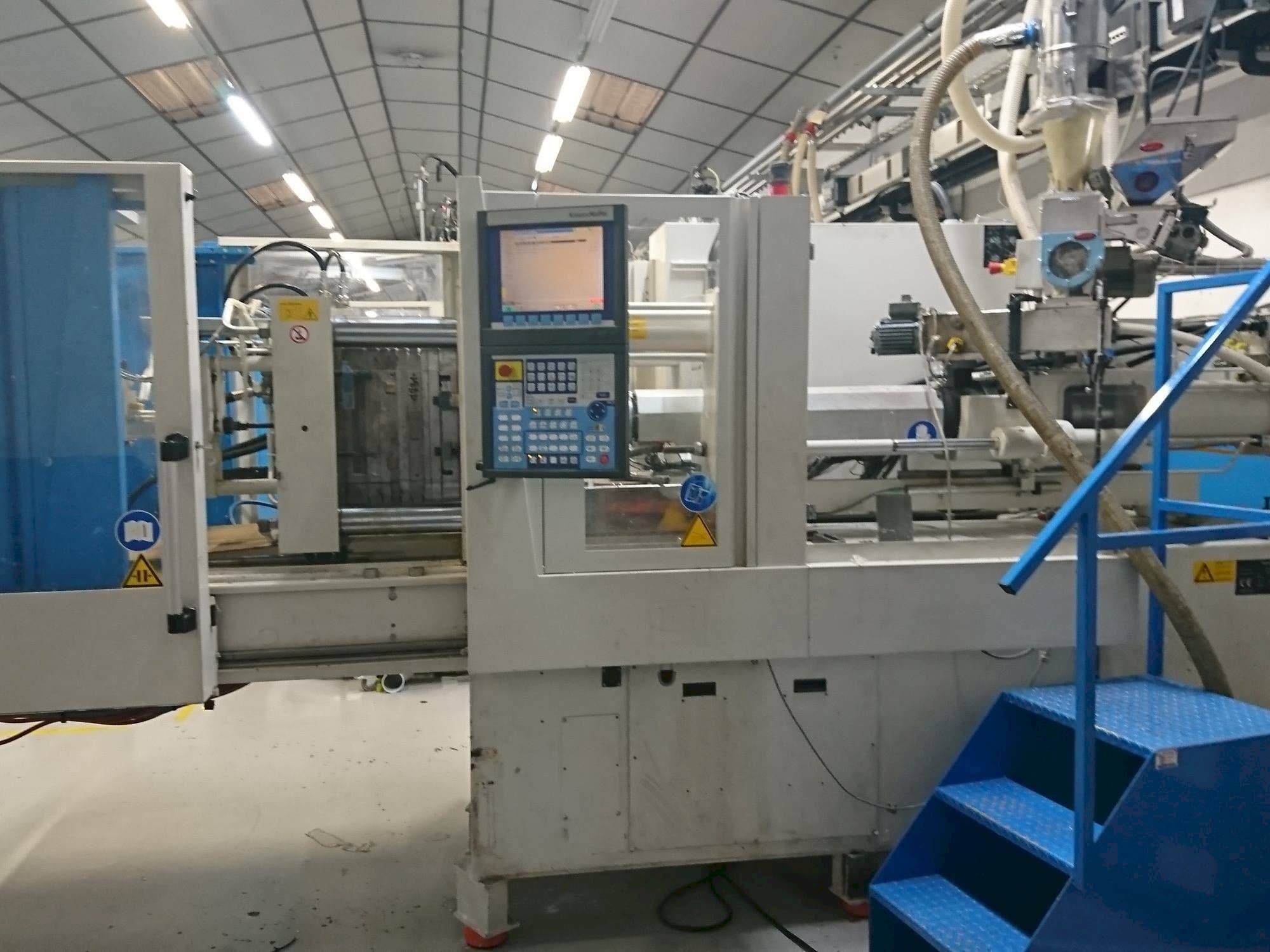 Vista Frontal da Krauss Maffei 80-750 CX máquina