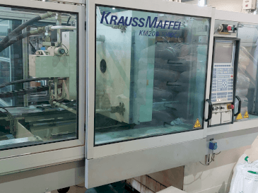Vista Frontal da Krauss Maffei 200-1000 C2 máquina