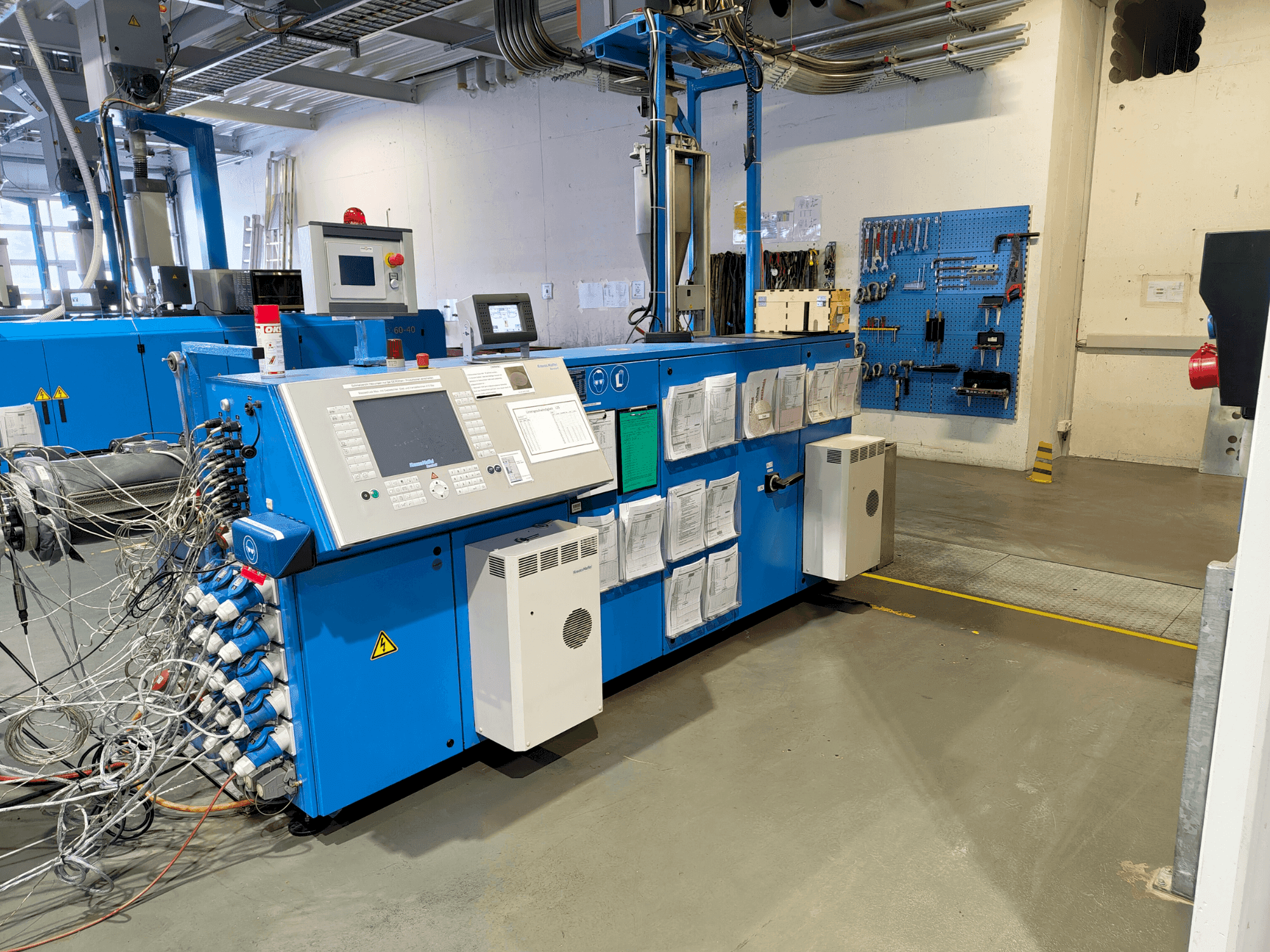 Vista Frontal da Krauss Maffei KME 75-36 R AC máquina