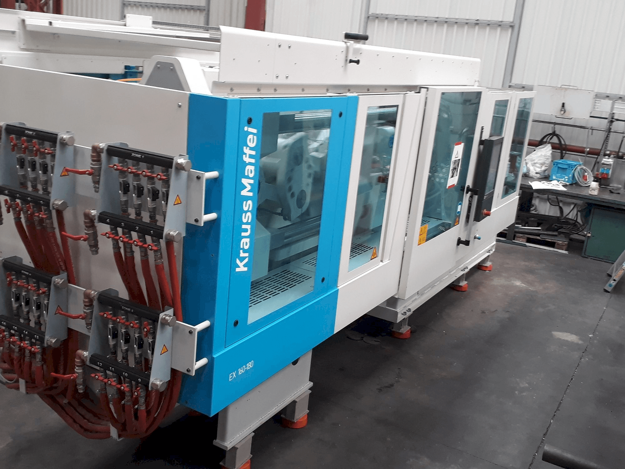 Vista Lateral Esquerda da Krauss Maffei 160-180 EX máquina