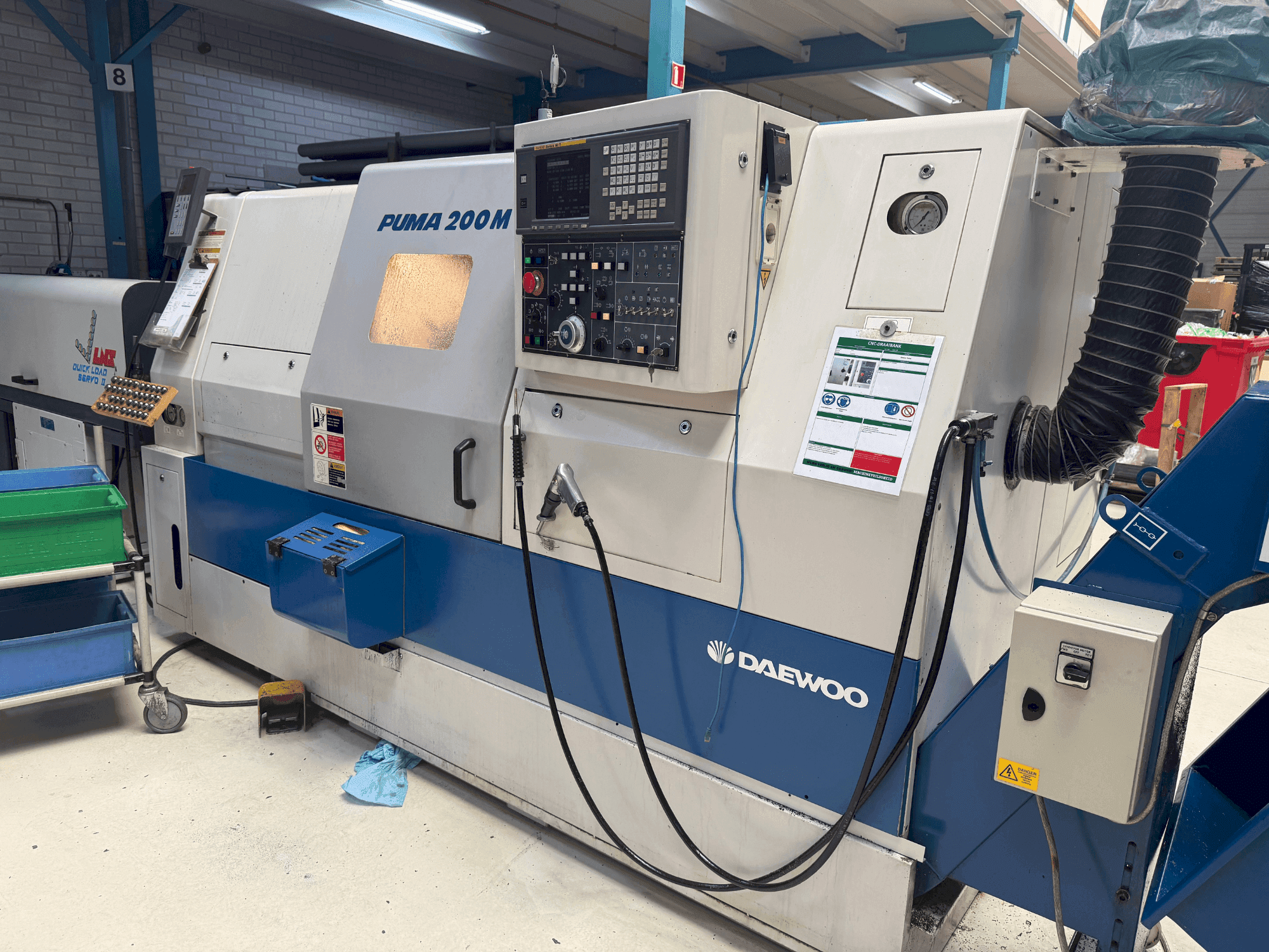 Vista Frontal da DAEWOO Puma 200 LMC máquina