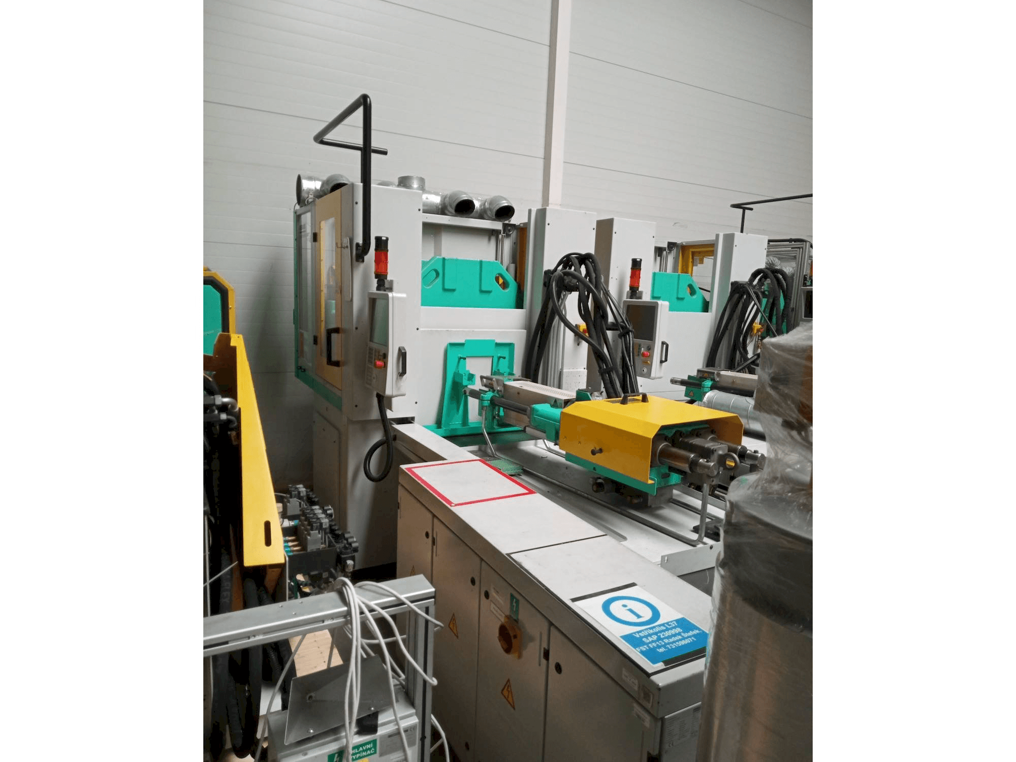 Vista Frontal da Arburg Allrounder 1200T-800-170 máquina