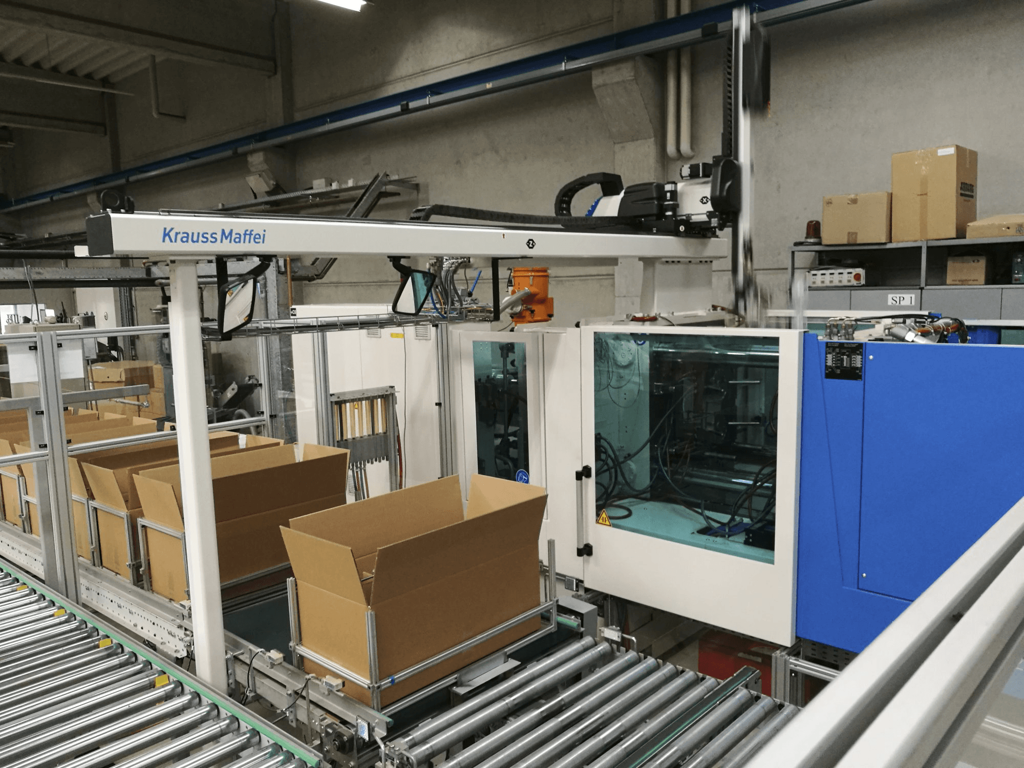 Vista Direita da Krauss Maffei 200-750 CX máquina