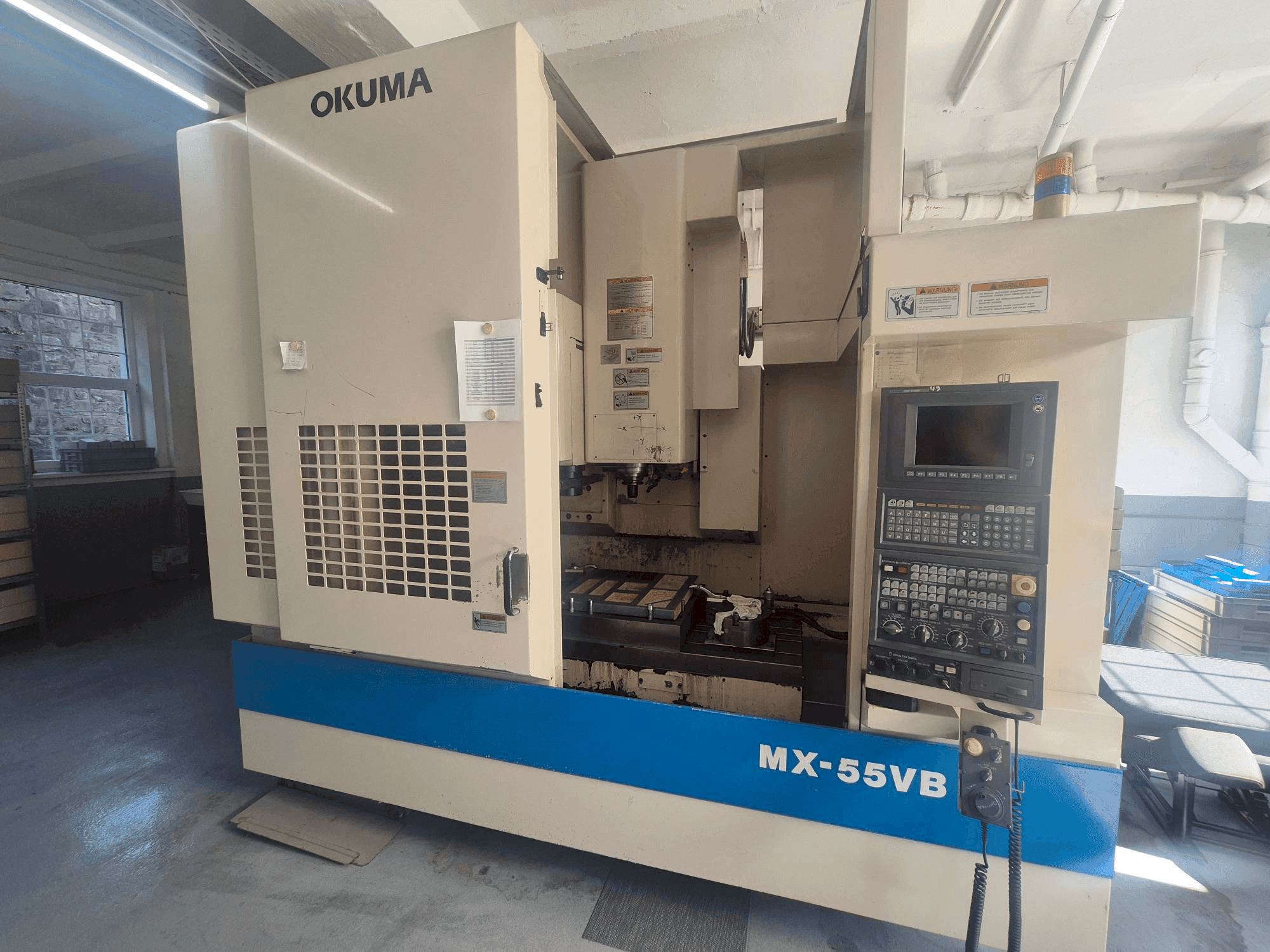 Vista Frontal da Okuma MX-55VB máquina