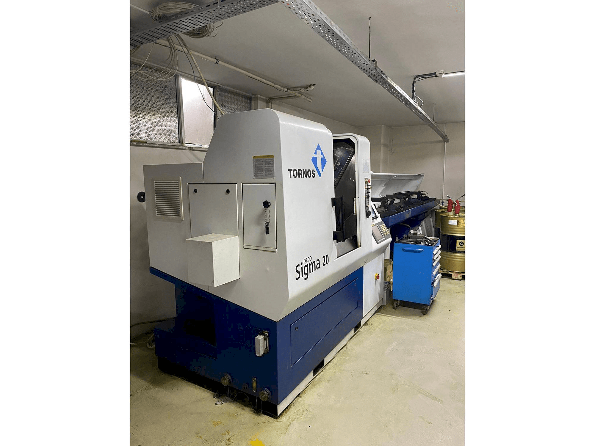 Vista Lateral Esquerda da Tornos Delta Sigma 20 máquina
