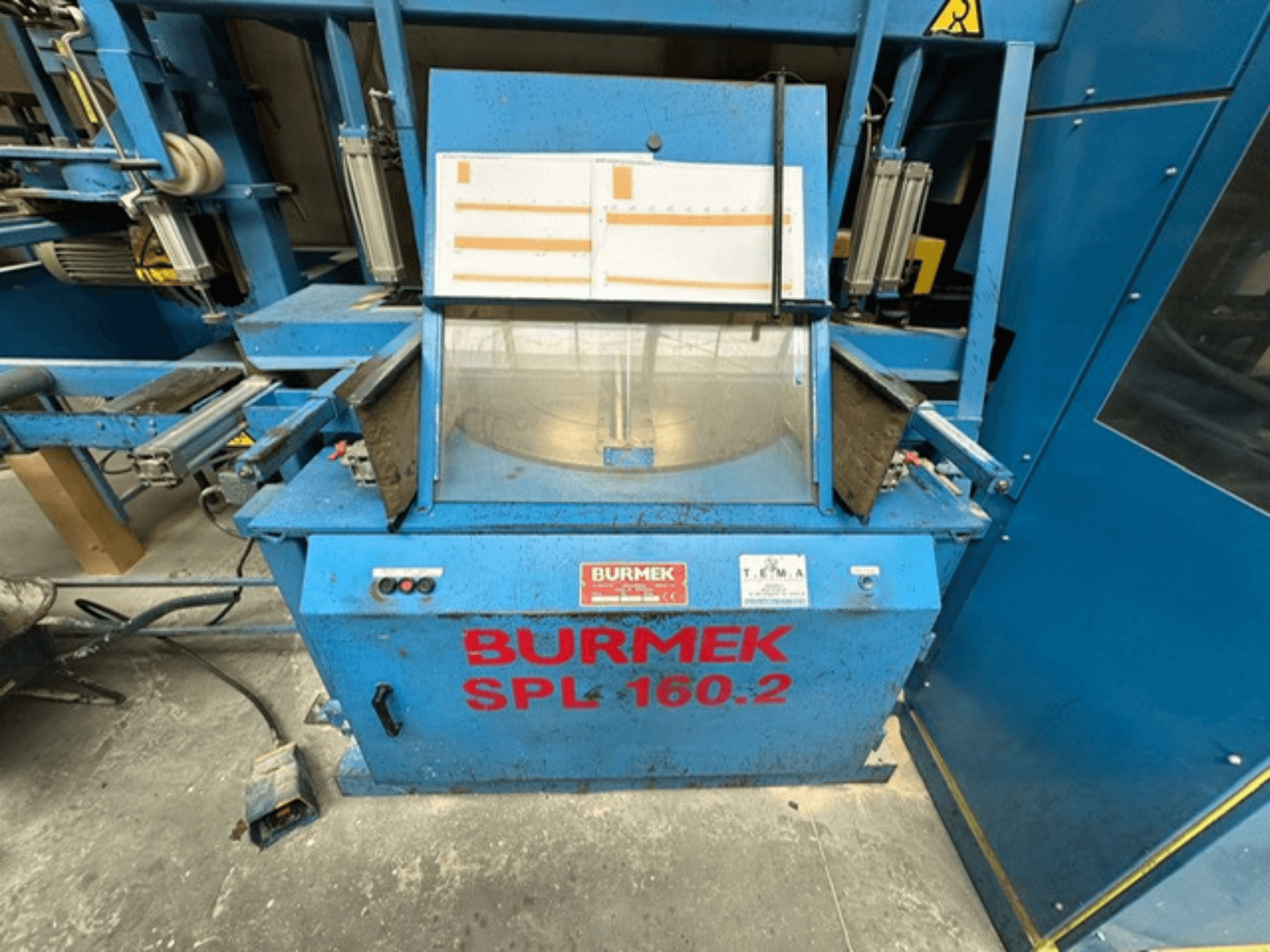 Máquina de madeira BURMEK SPL 160.2 azul, vista frontal, com botões de controlo e um painel de vidro que mostra o interior.