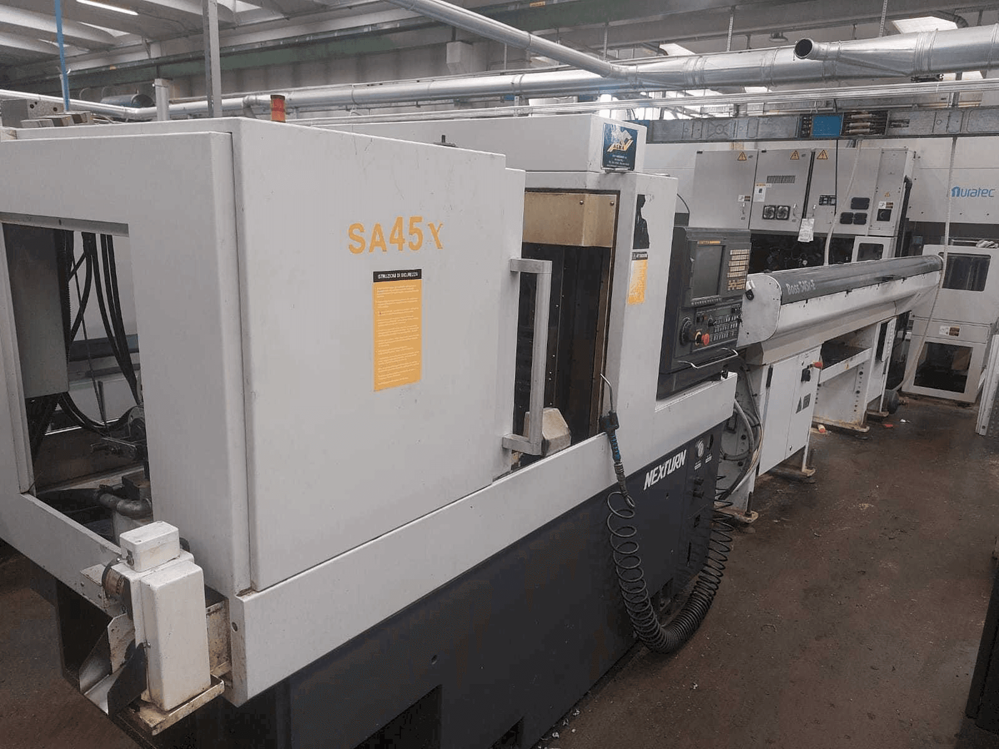 Vista Lateral Esquerda da Nexturn SA 45X máquina