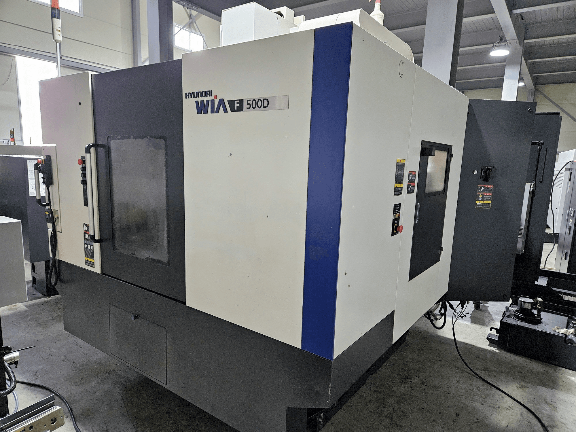 Vista Frontal da Hyundai Wia Wia F500D máquina