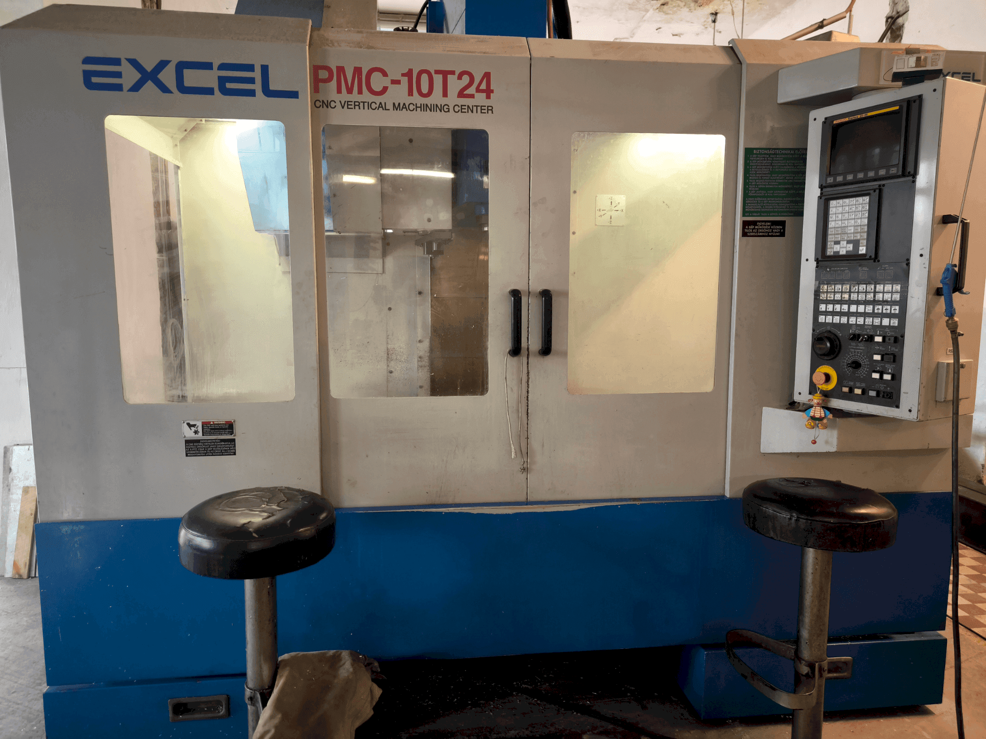 Vista Frontal da Excel Excel PMC 10T24 (2004) máquina