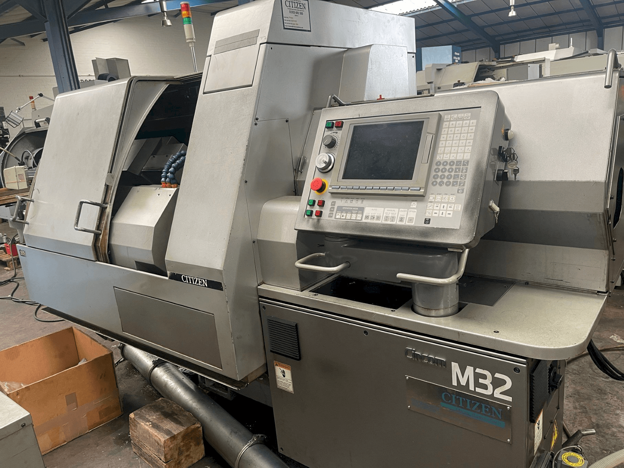 Vista Frontal da Citizen M-32V máquina