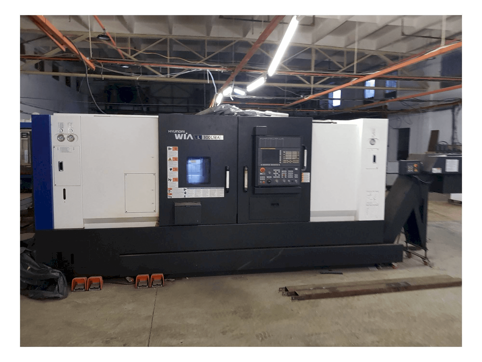 Vista Frontal da Hyundai Wia L300LMA máquina