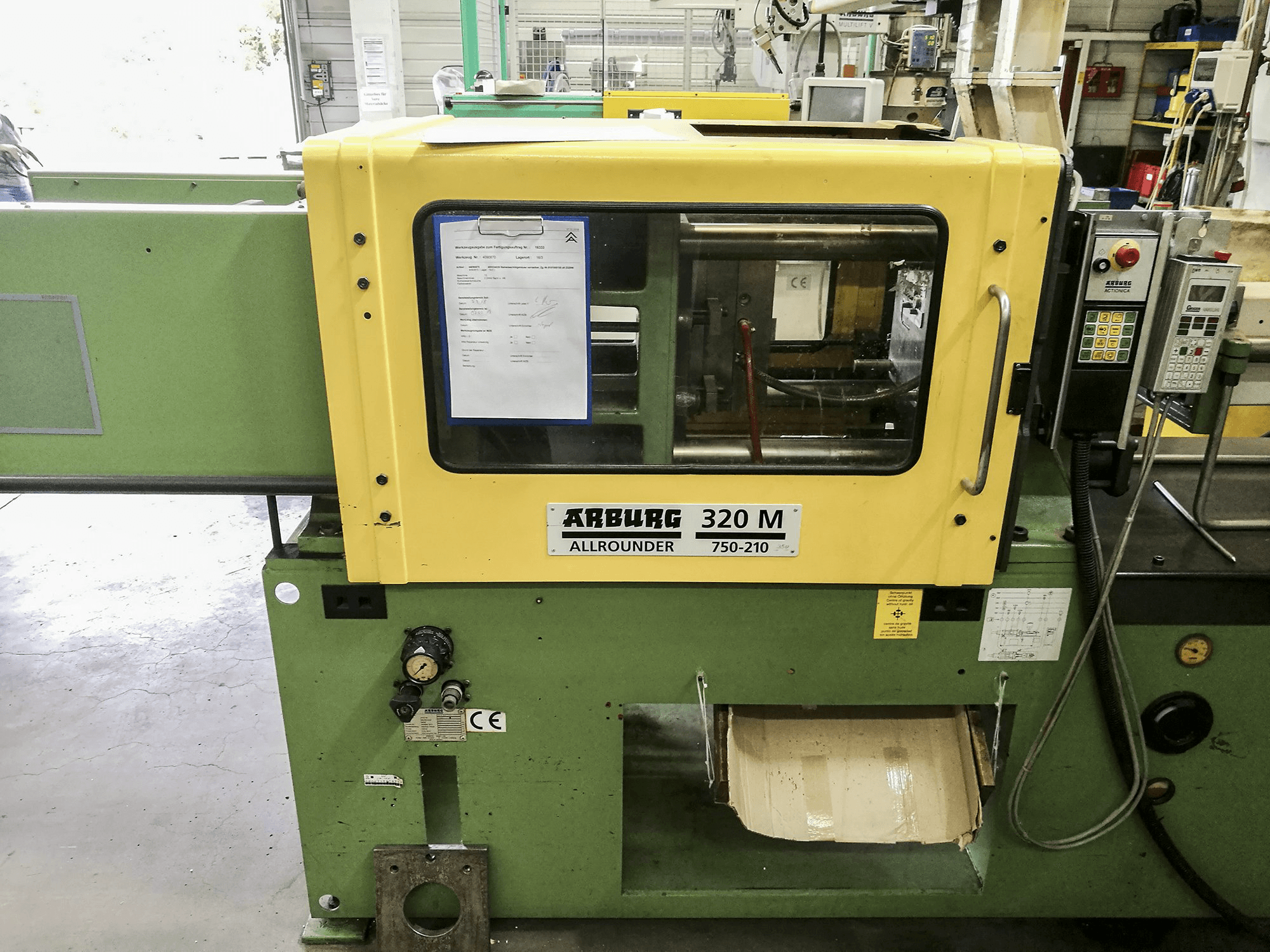 Vista Frontal da Arburg 320M 750-210 máquina
