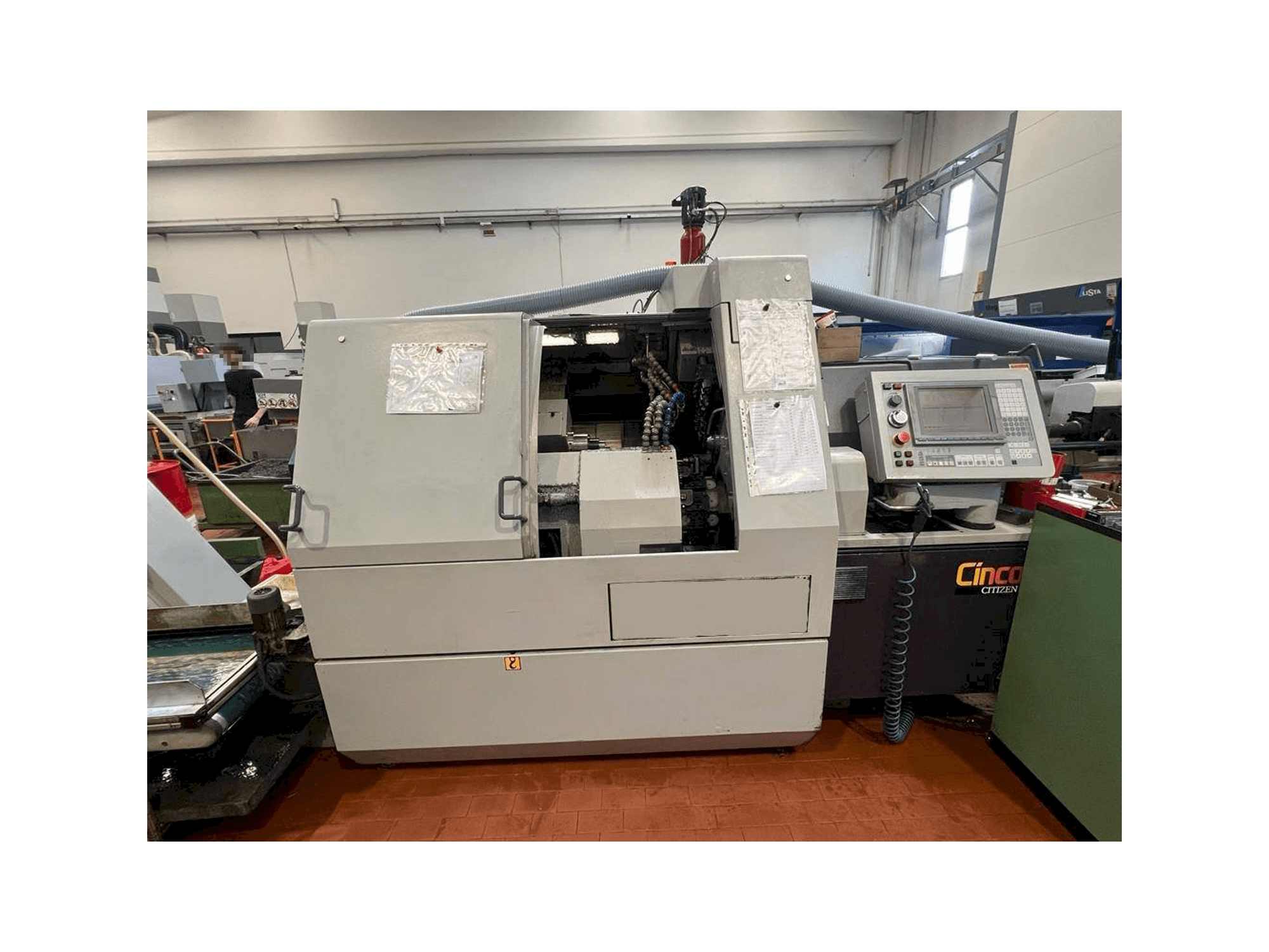 Vista Frontal da Citizen M32 máquina