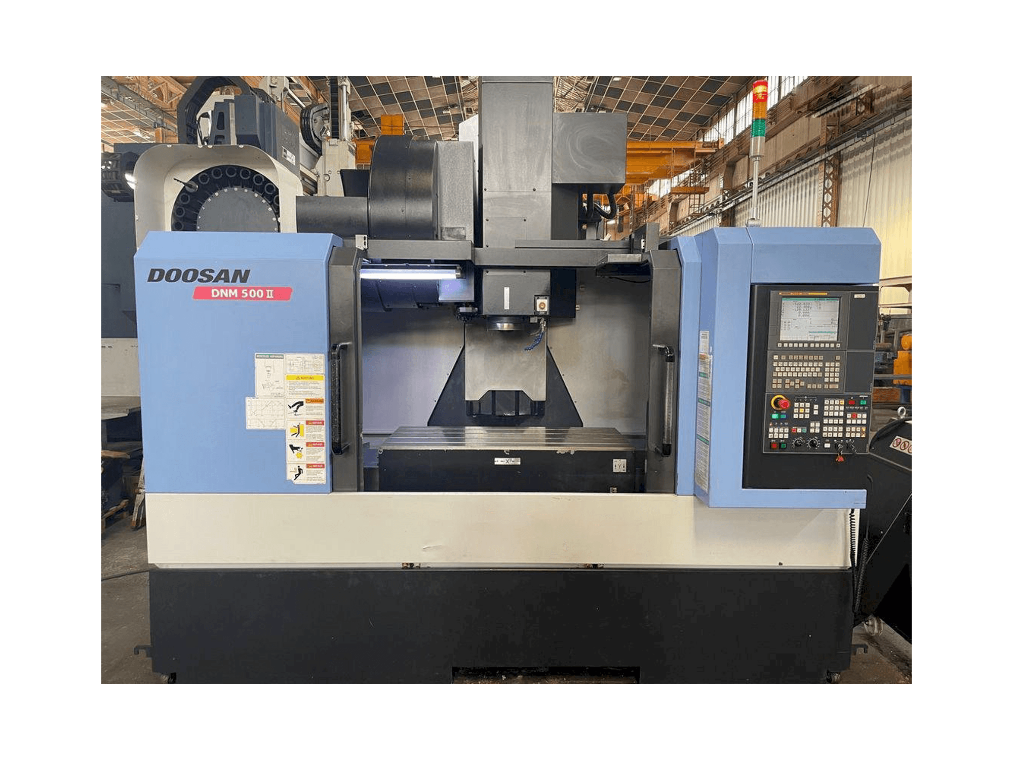 Vista Frontal da Doosan MYNX DNM 500 II máquina