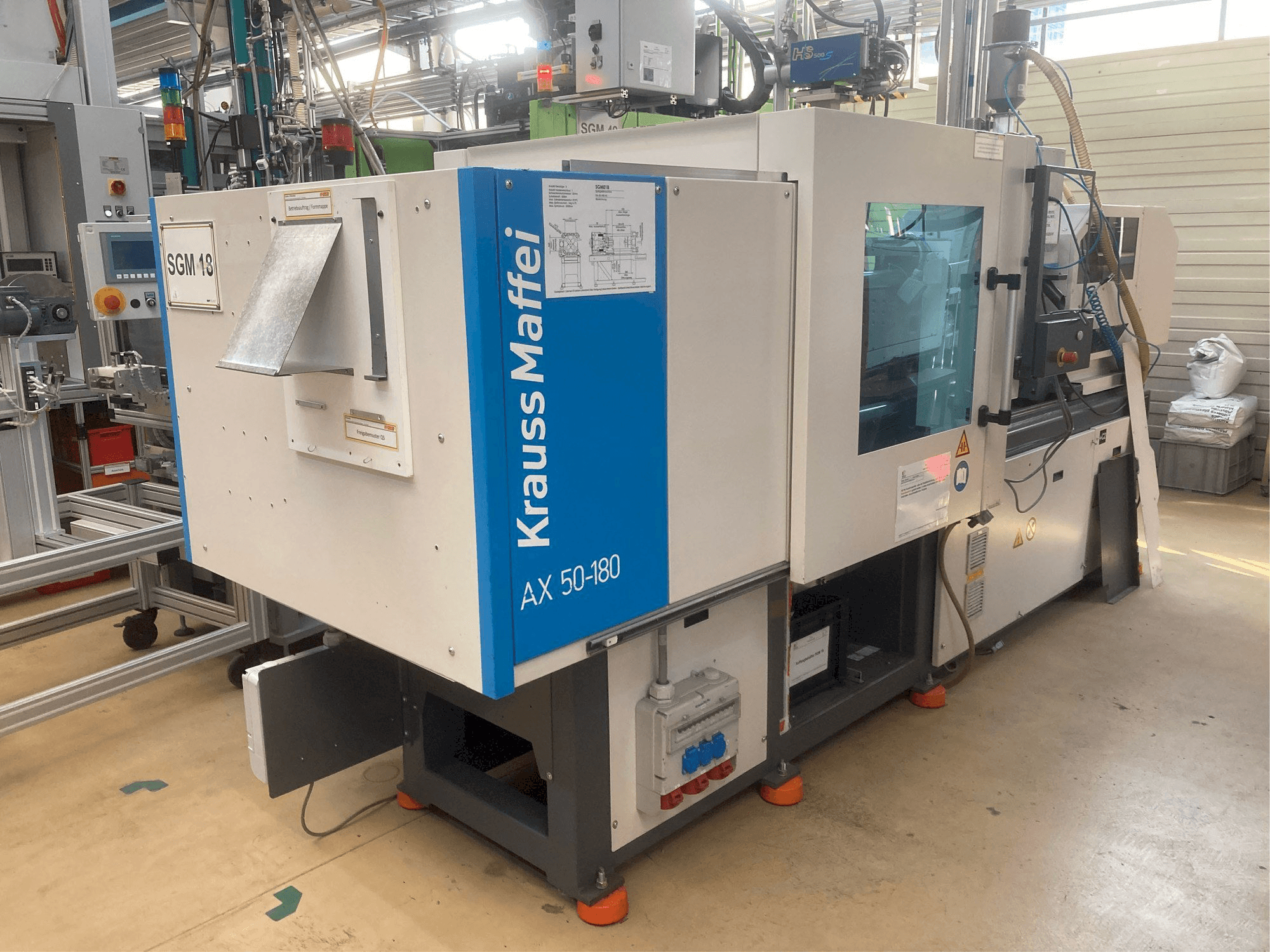 Vista Lateral Esquerda da Krauss Maffei AX 50-180 máquina