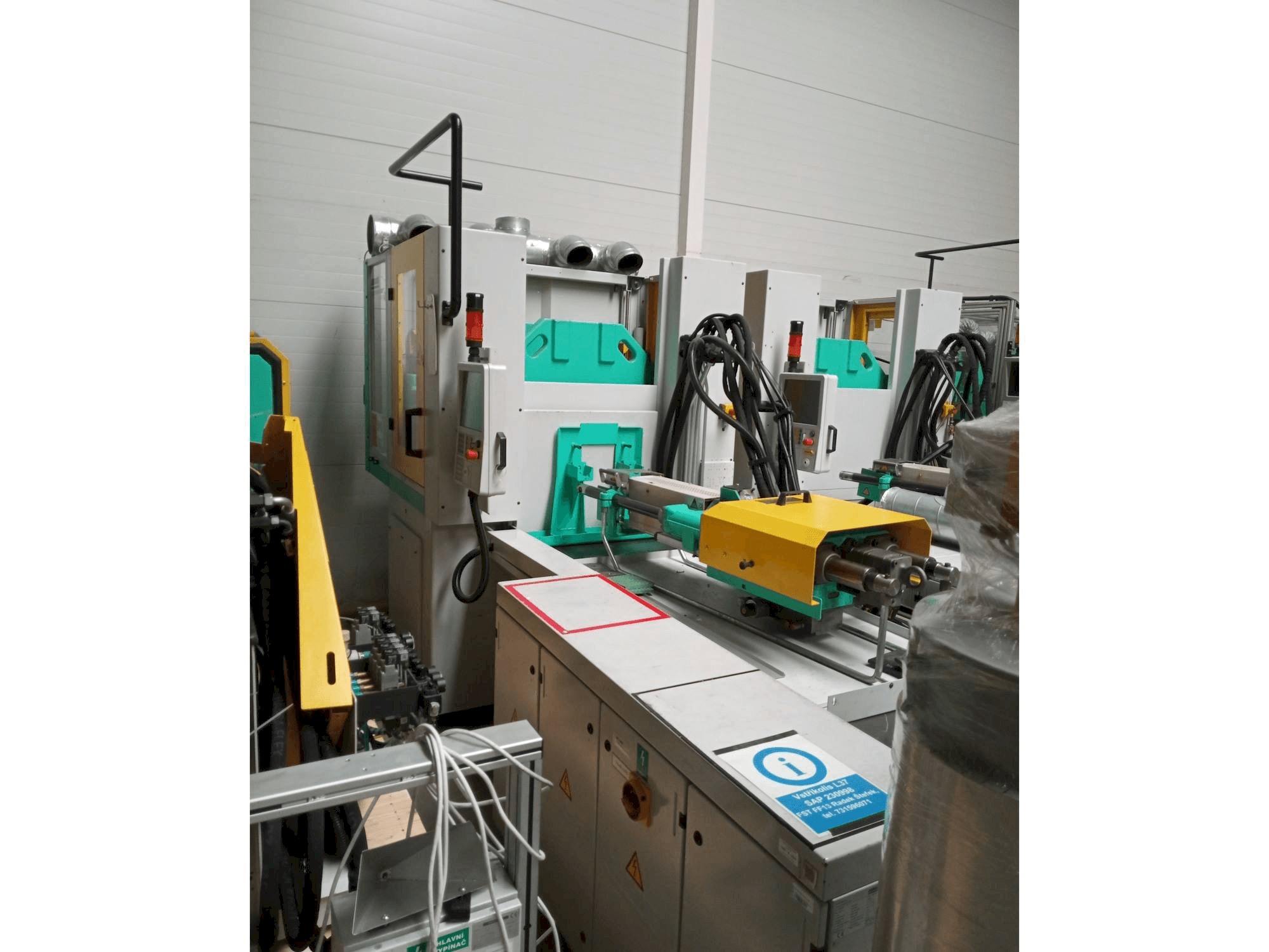 Vista Frontal da Arburg Allrounder 1200T-800-150 máquina