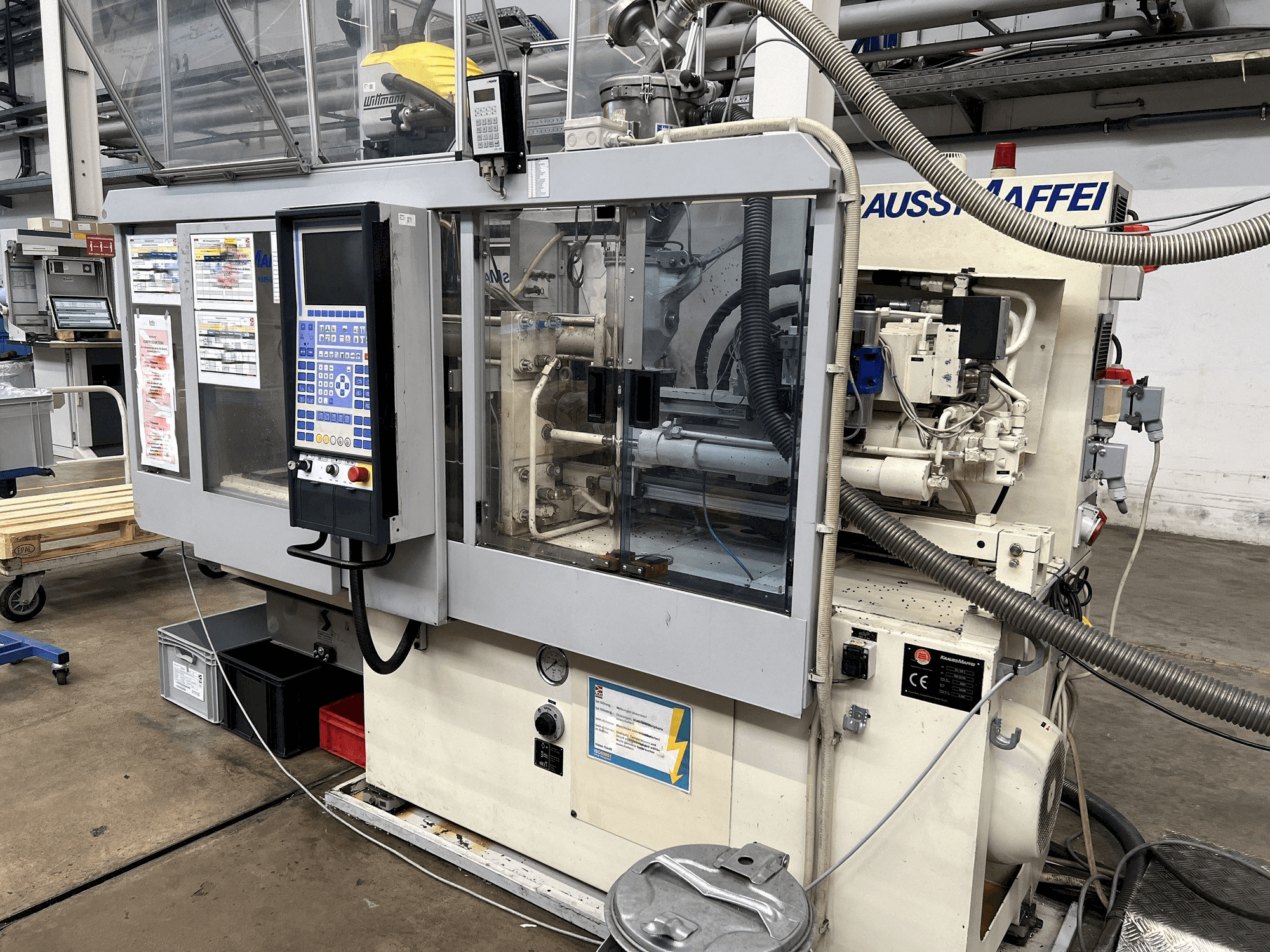 Vista Frontal da Krauss Maffei KM 50-125 C1 máquina