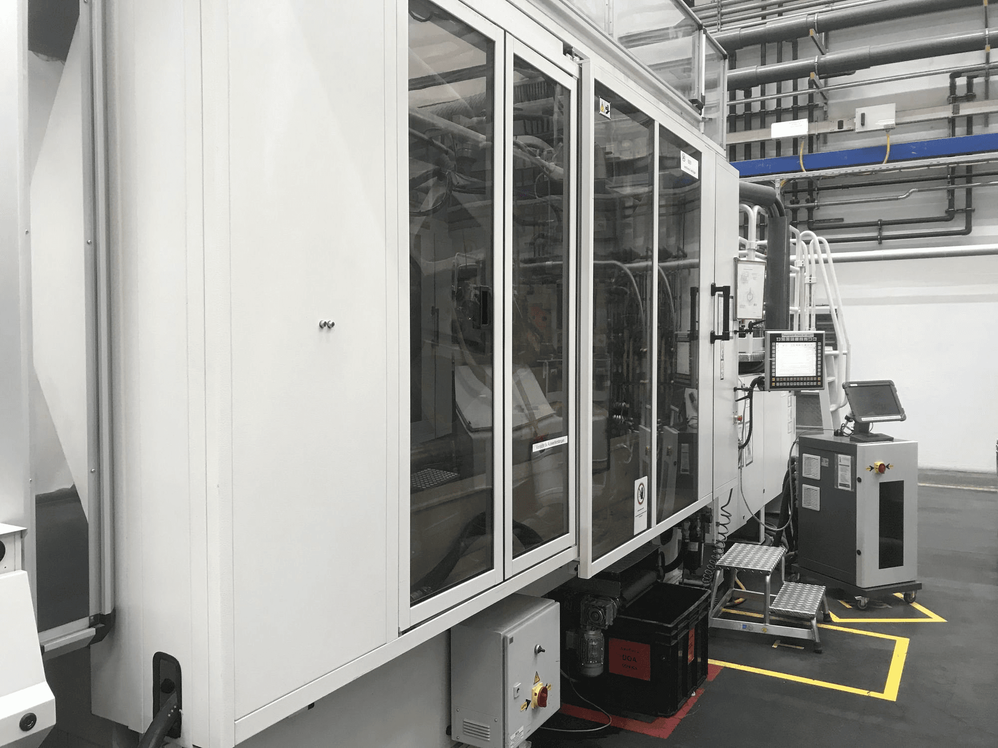 Vista Lateral Esquerda da Husky H500 RS 65/60 máquina