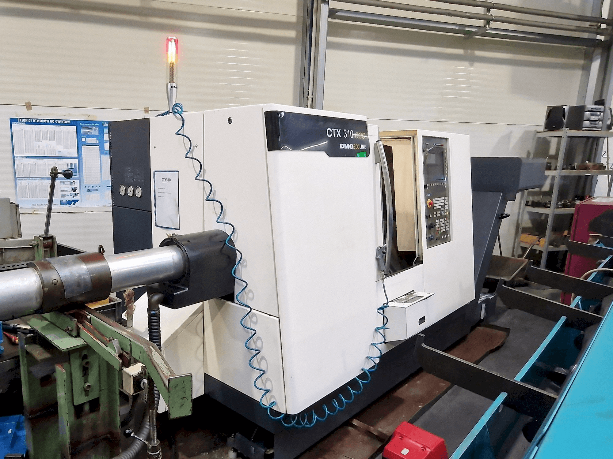 Vista Lateral Esquerda da DMG CTX 310 ecoline máquina