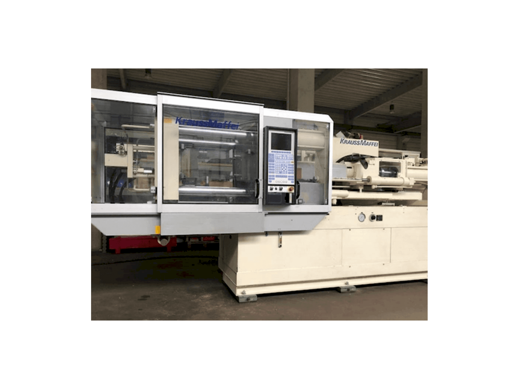 Vista Frontal da Krauss Maffei 150-700 C2 máquina