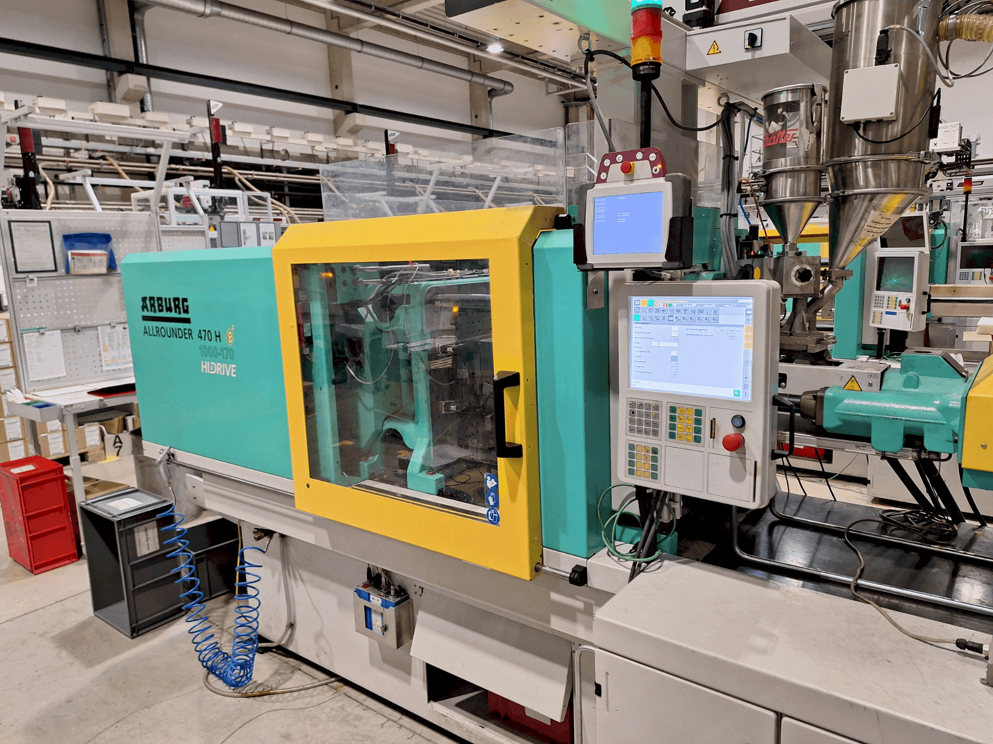 Vista Frontal da Arburg 470 H 1000-170 máquina