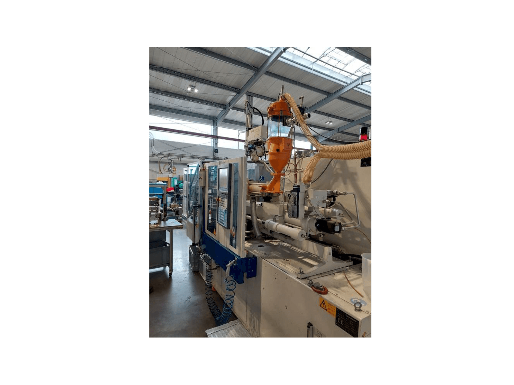 Vista Frontal da Krauss Maffei 80-180 CX máquina