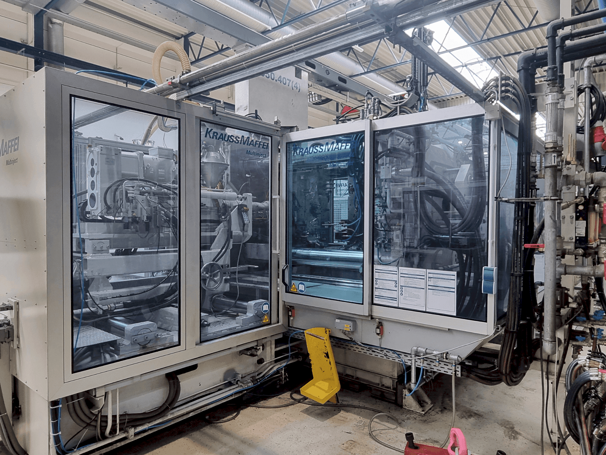 Vista Frontal da Krauss Maffei 650-2700-390 CL máquina