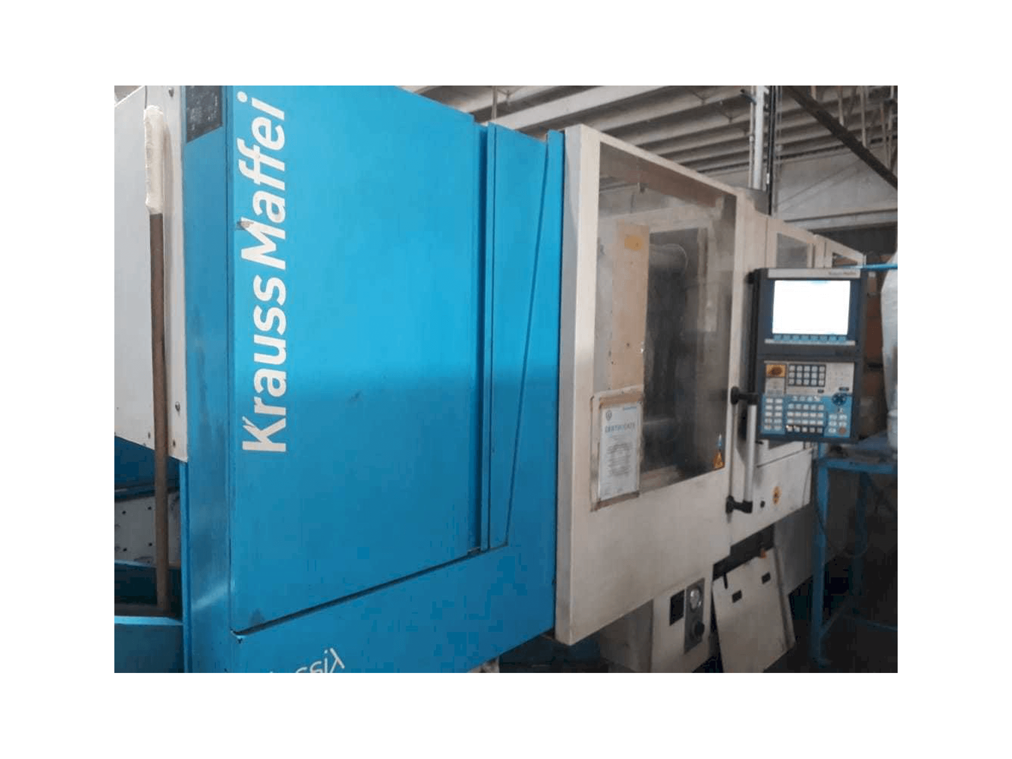 Vista Frontal da Krauss Maffei 160/750 CX máquina