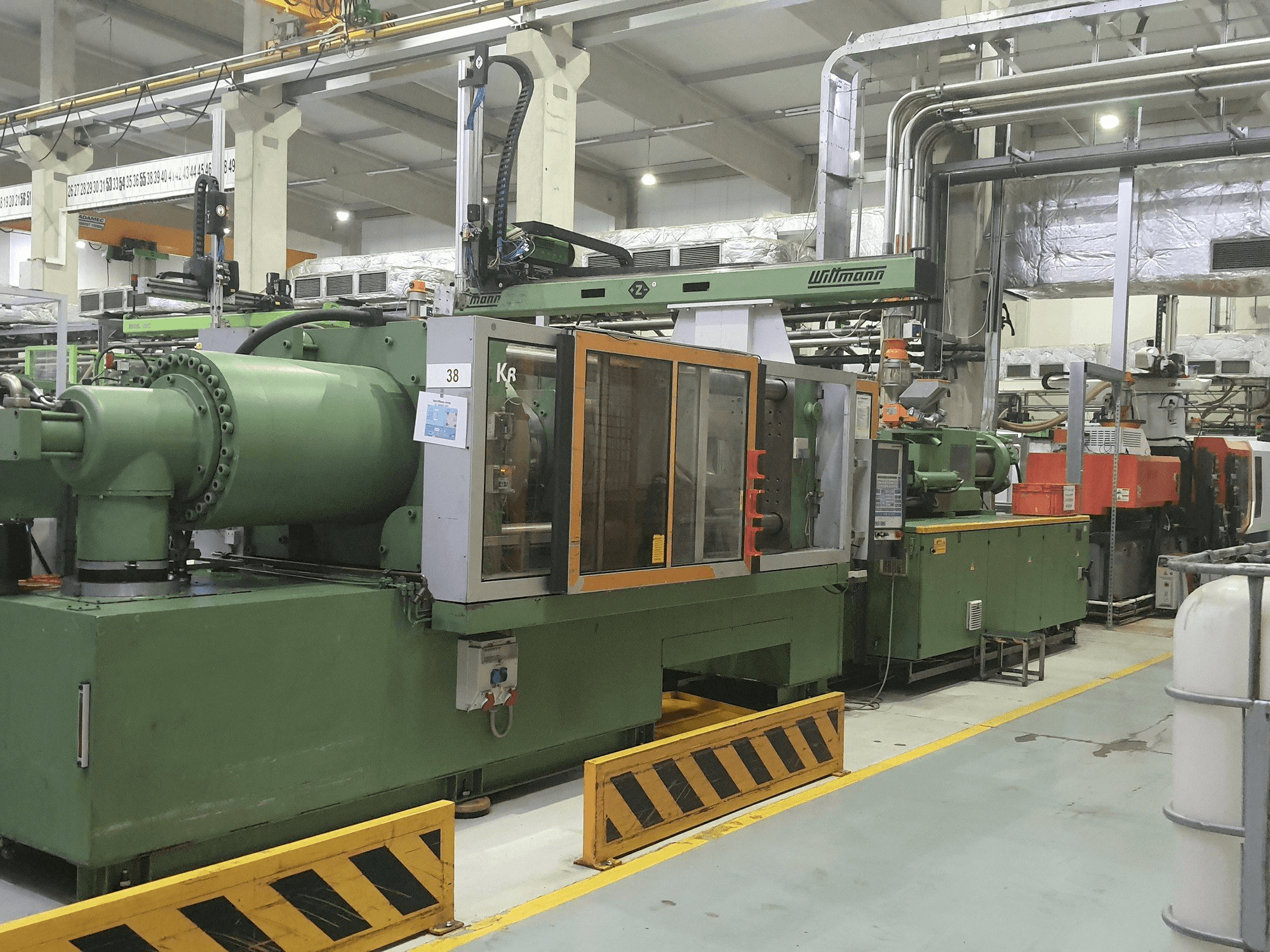 Vista Frontal da Krauss Maffei 420-3000 máquina