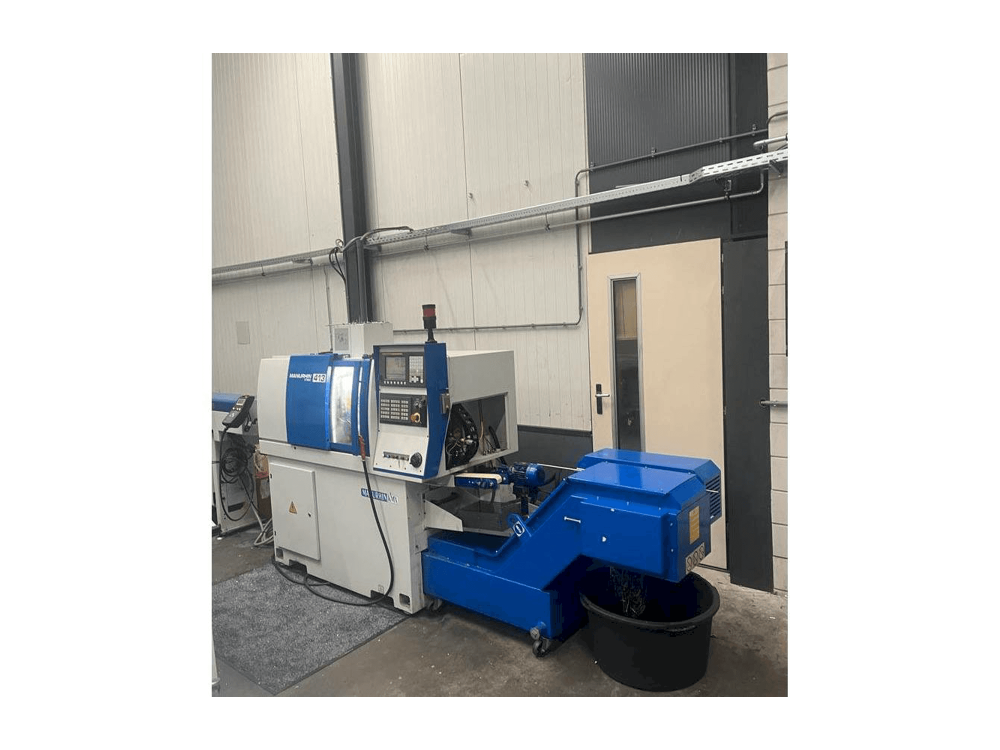 Vista Frontal da Manurhin K'MX 413 máquina