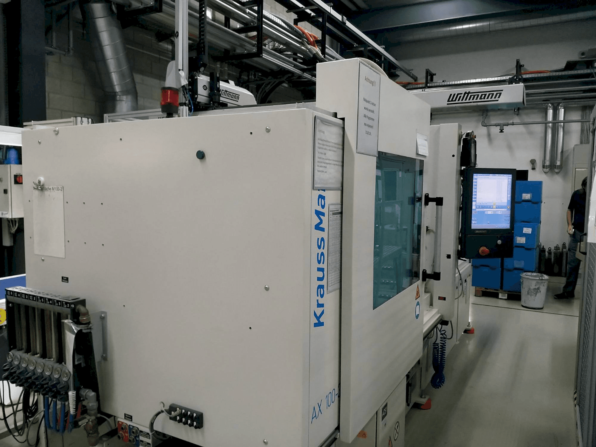 Vista Frontal da Krauss Maffei 100-380 AX máquina