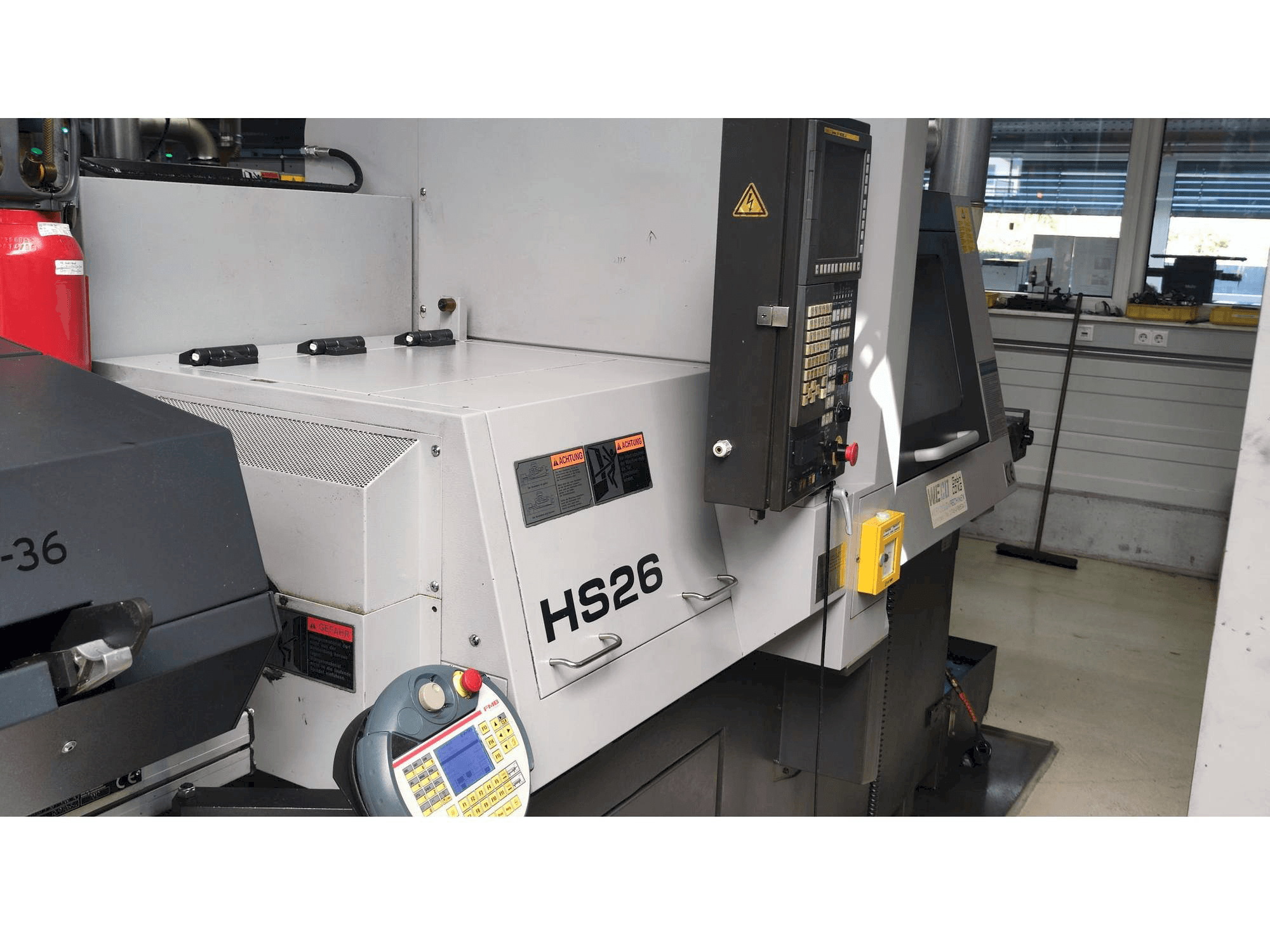 Vista Lateral Esquerda da TSUGAMI HS26 máquina