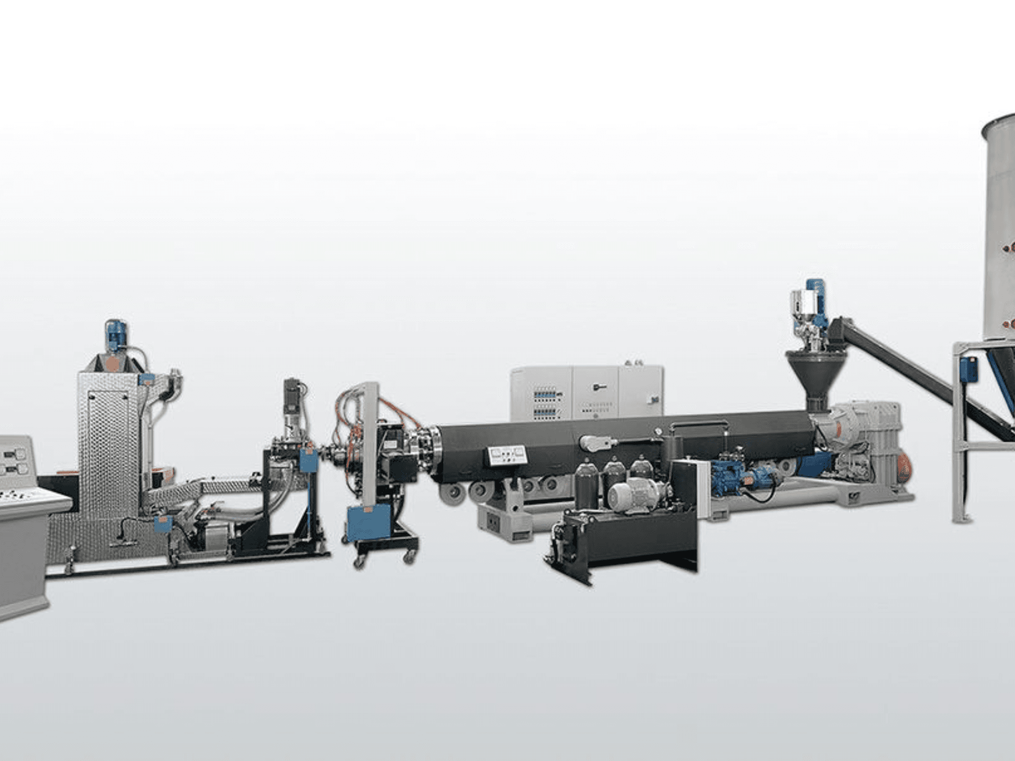 Máquina de processamento de plástico TECNOVA ES130N 37D DEG, vista lateral que mostra os componentes e os comandos para um funcionamento eficiente.