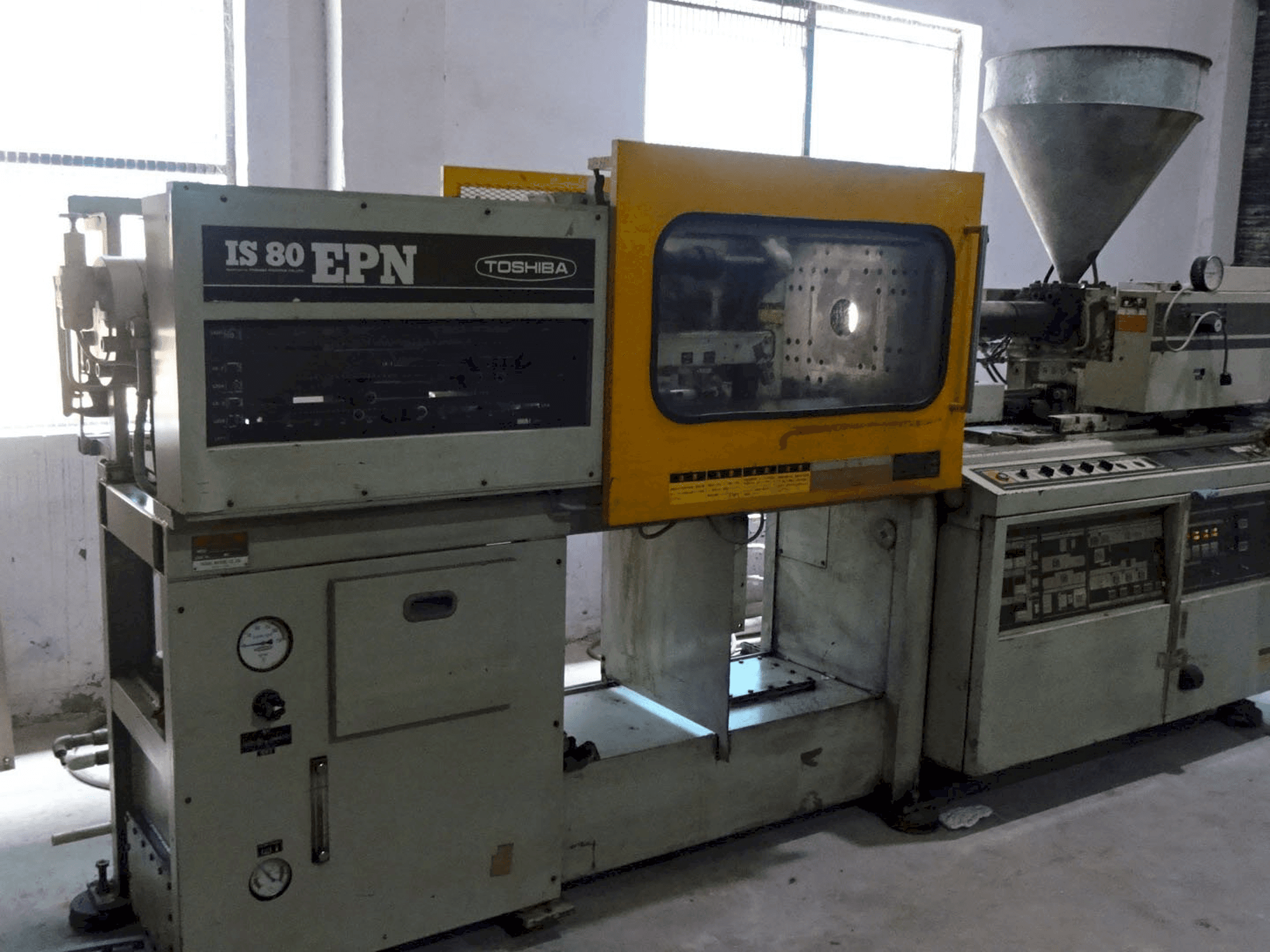 Left view of Toshiba IS 80 EPN 2A Machine