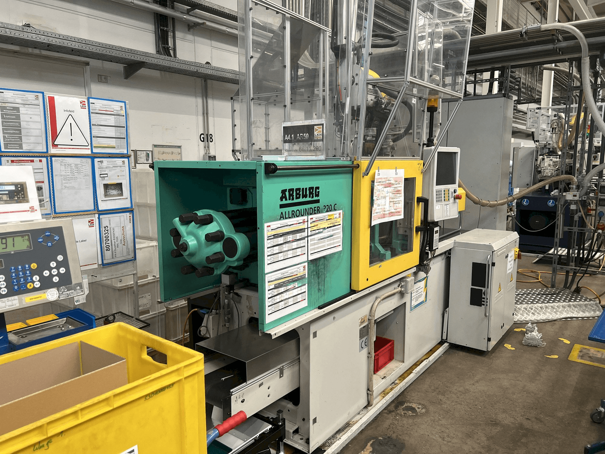 Vista Lateral Esquerda da Arburg Allrounder 320C 500 - 170 máquina