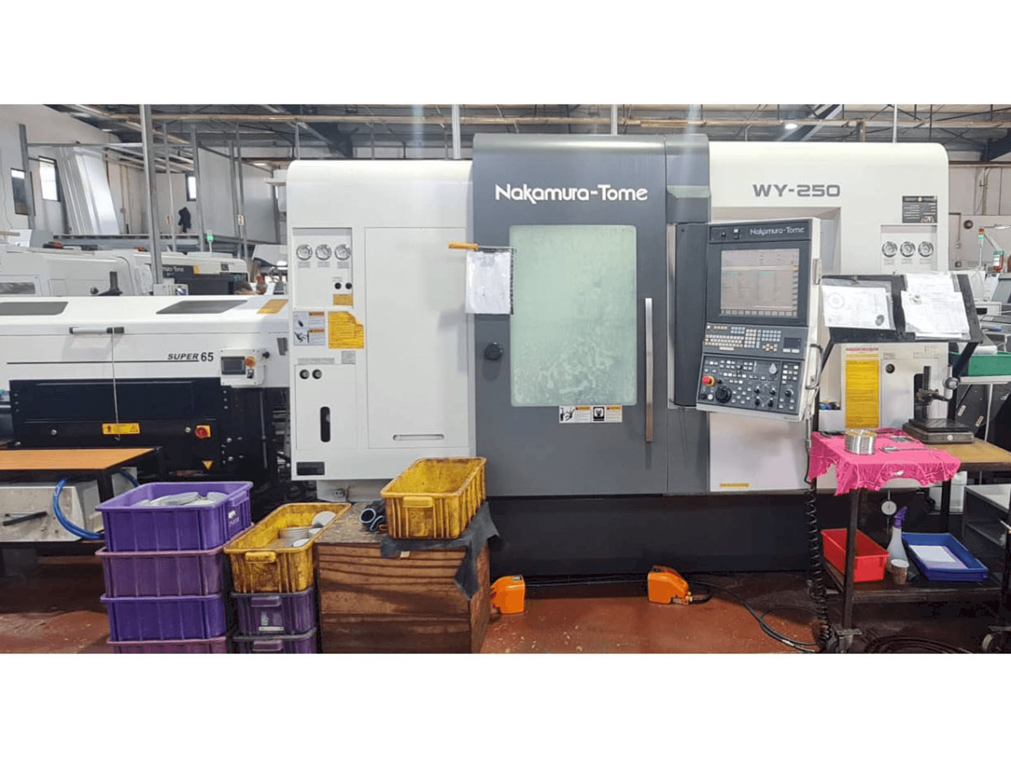 Vista Frontal da NAKAMURA-TOME WY 250 máquina