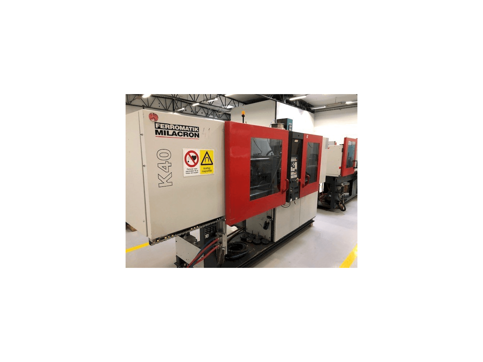 Vista Lateral Esquerda da FERROMATIK MILACRON K40 D-E máquina
