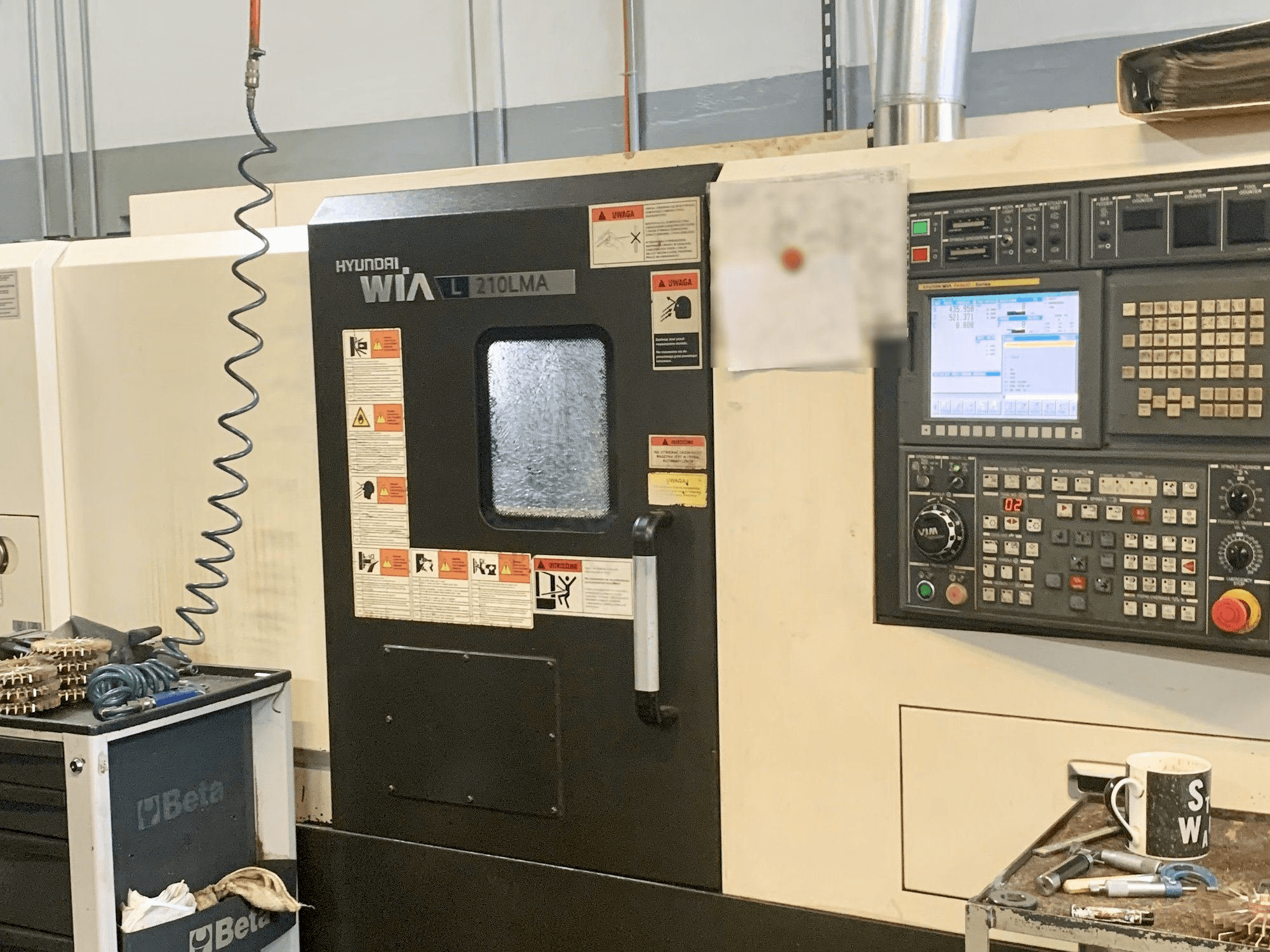 Vista Frontal da Hyundai Wia L210LMA máquina