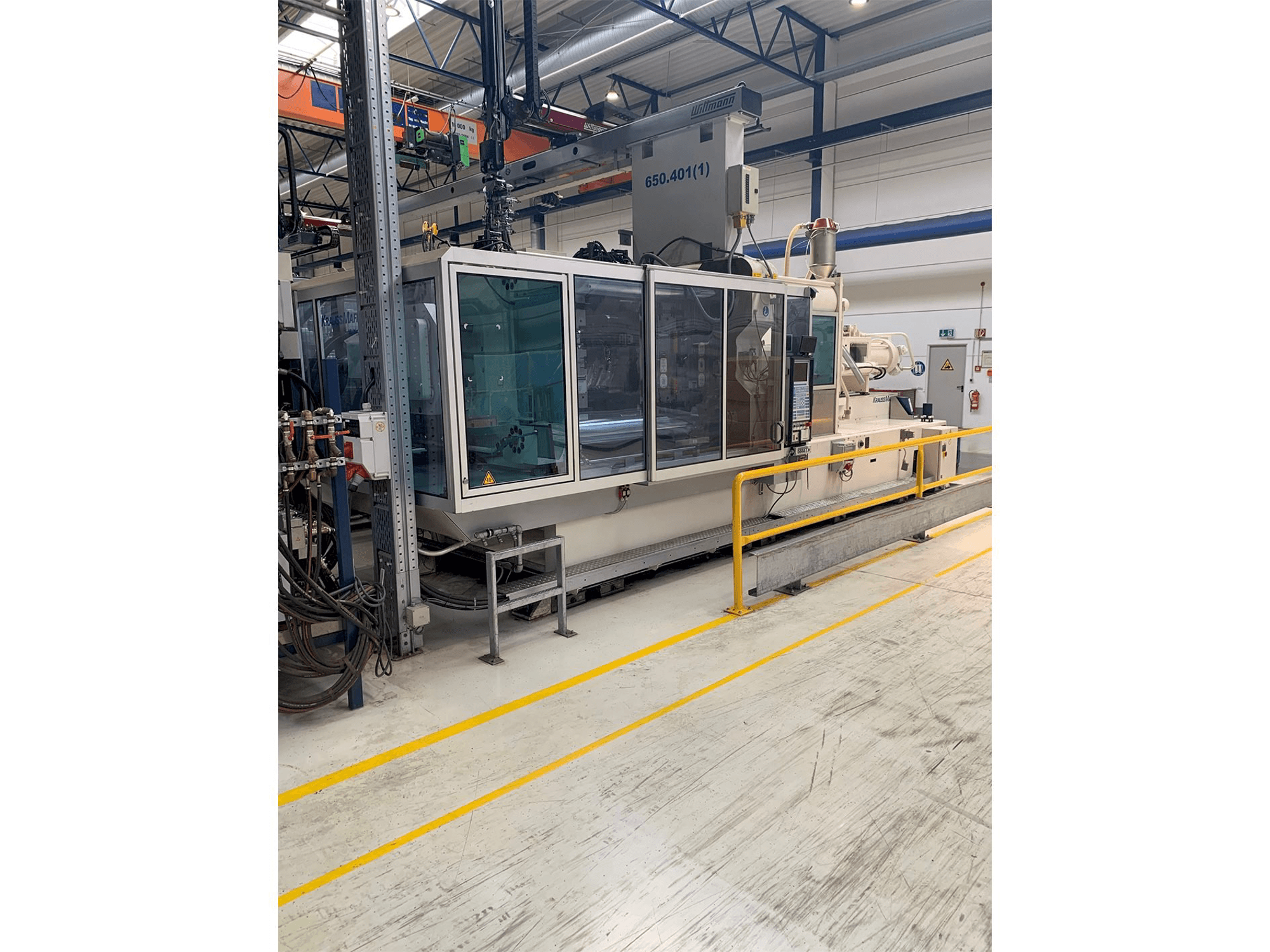 Vista Frontal da Krauss Maffei 650-2700-520 CL máquina